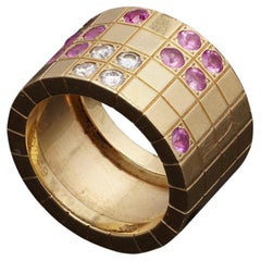 Cartier Lanieres Ring aus 18 Karat Gelbgold mit Diamant und rosa Saphir