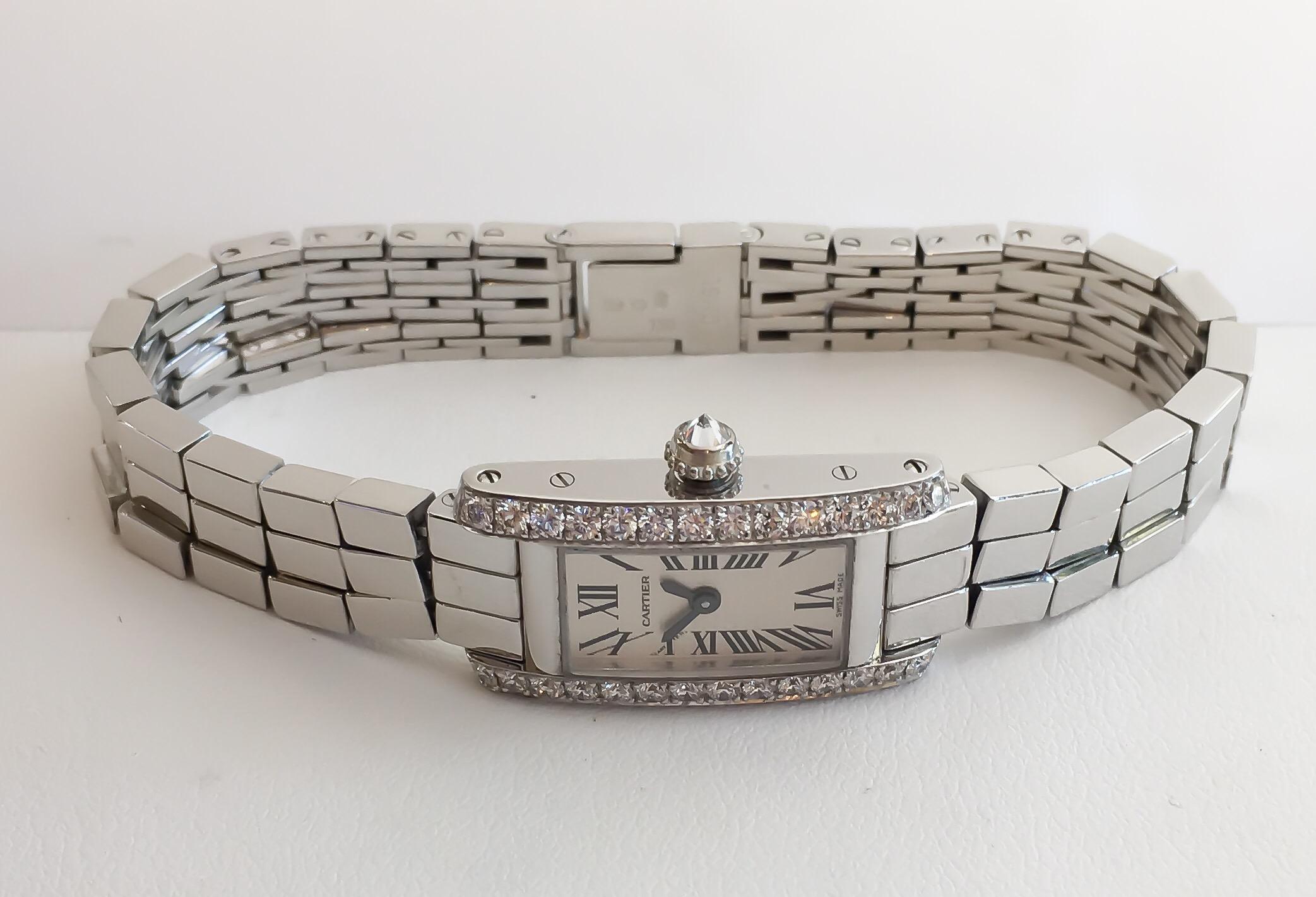 Cartier Lanieres Allongee 18K White Gold Diamond Case Quartz Watch

•MODEL NO: W15364W3
•REFERENCE NO: 2544
•MOVEMENT: QUARTZ BATTERY
•CASE MATERIAL: SOLID 18K WHITE GOLD
•CONDITION: LIKE NEW EXCELLENT PRE-OWNED
•CASE MEASUREMENTS: 27MM X 15MM (NOT