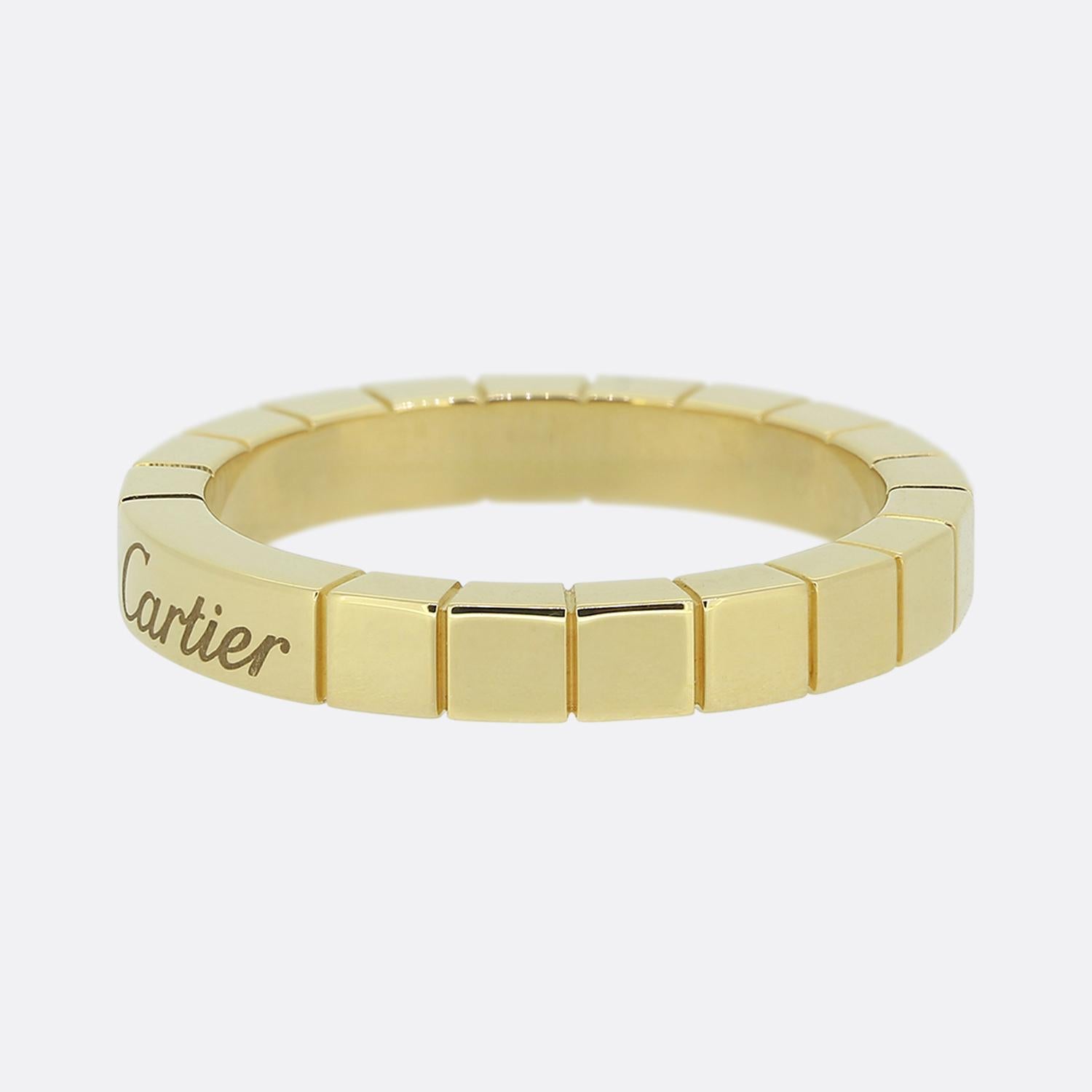 Here we have an 18ct yellow gold band ring from the world renowned luxury jewellery house of Cartier. The ring features a segmented box-like design with the Cartier signature at the front of the face whilst the remainder band possesses a polished
