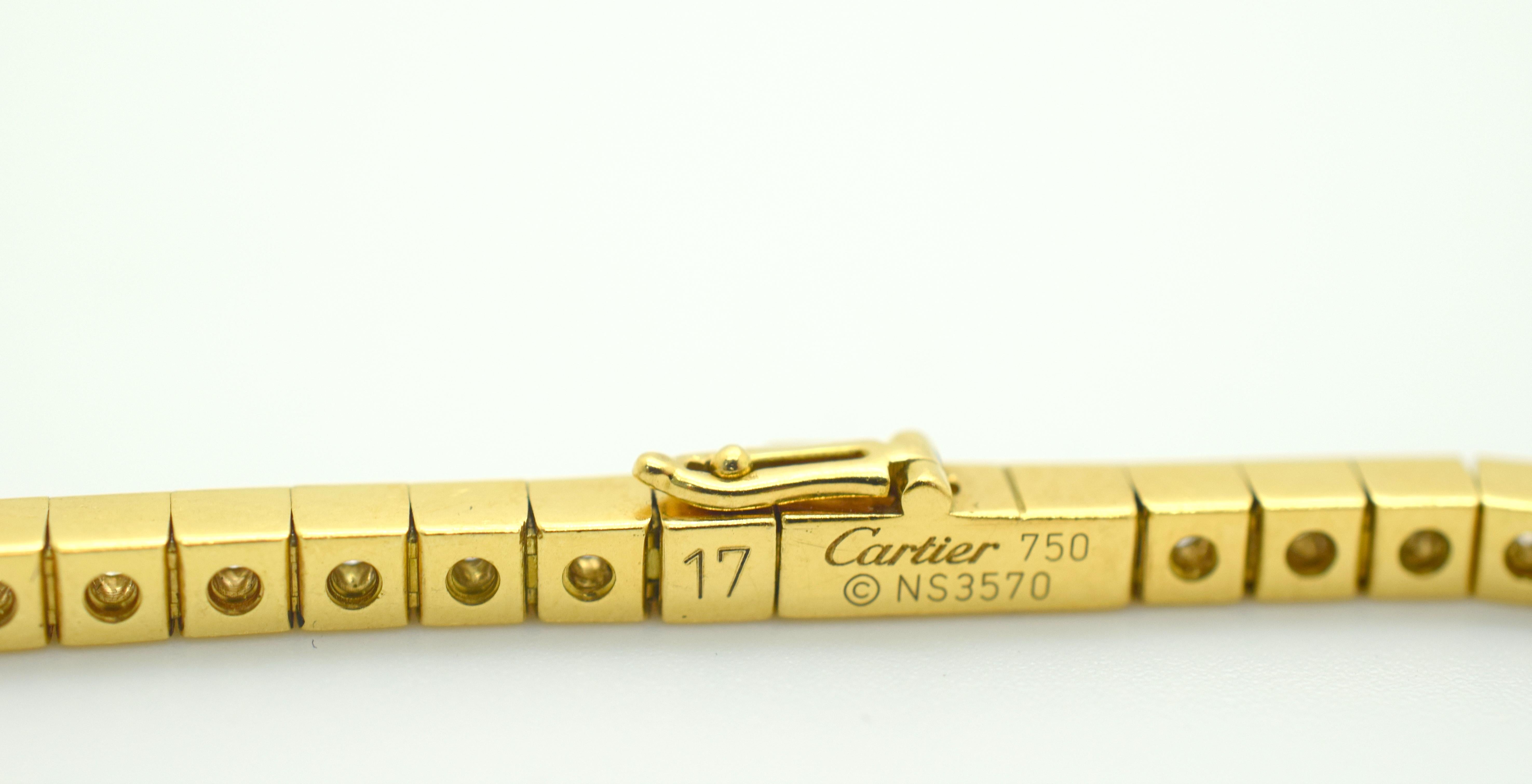 Cartier Lanieres Diamond 18K Yellow Gold Diamond Tennis Bracelet 17CM.
Gorgeous classic design by famed designer Cartier. 
The tennis bracelet is crafted in 18k Yellow Gold, with stunning diamonds throughout. Diamonds are all F color Vs clarity,