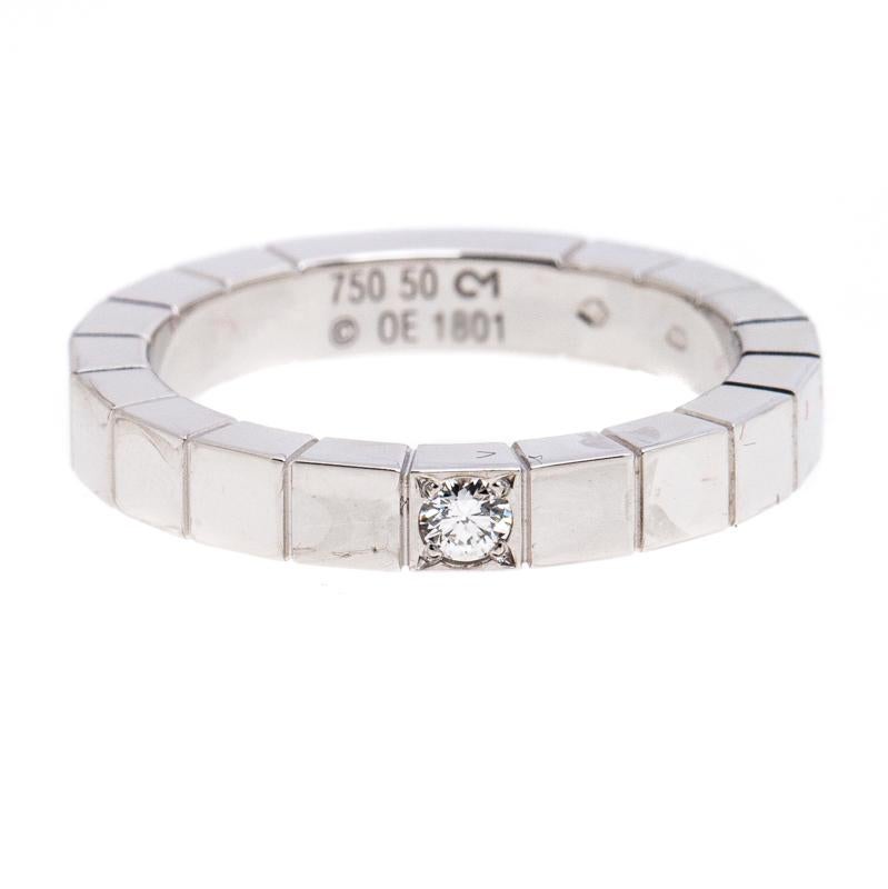 Gift yourself some love with this elegant ring from Cartier! The ring is impeccably sculpted from 18k white gold and detailed with cube-like textures. The textured band is joined by a single diamond, enough to sparkle and light up any moment. A