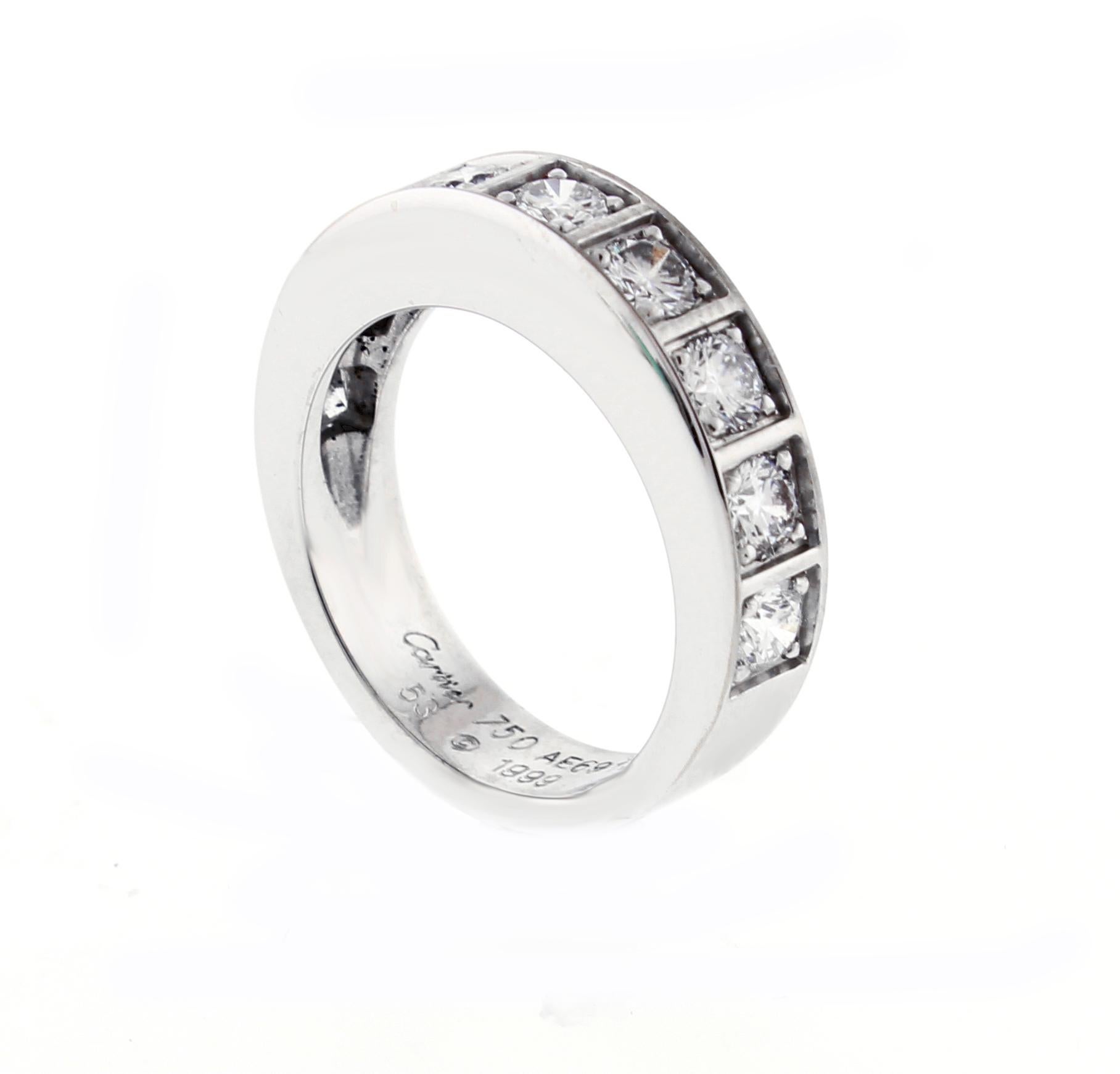 From Cartier's Lanières collection,  a part circle diamond band ring.
♦ Designer: Cartier
♦ Metal: 18 karat white gold
♦ 9 diamonds=1.62 caratE_F VVS
♦ 8mm wide
♦ Circa 1999
♦ Size  6 ¾ US,  53 French , some adjustment
♦ Packaging: Cartier box
♦