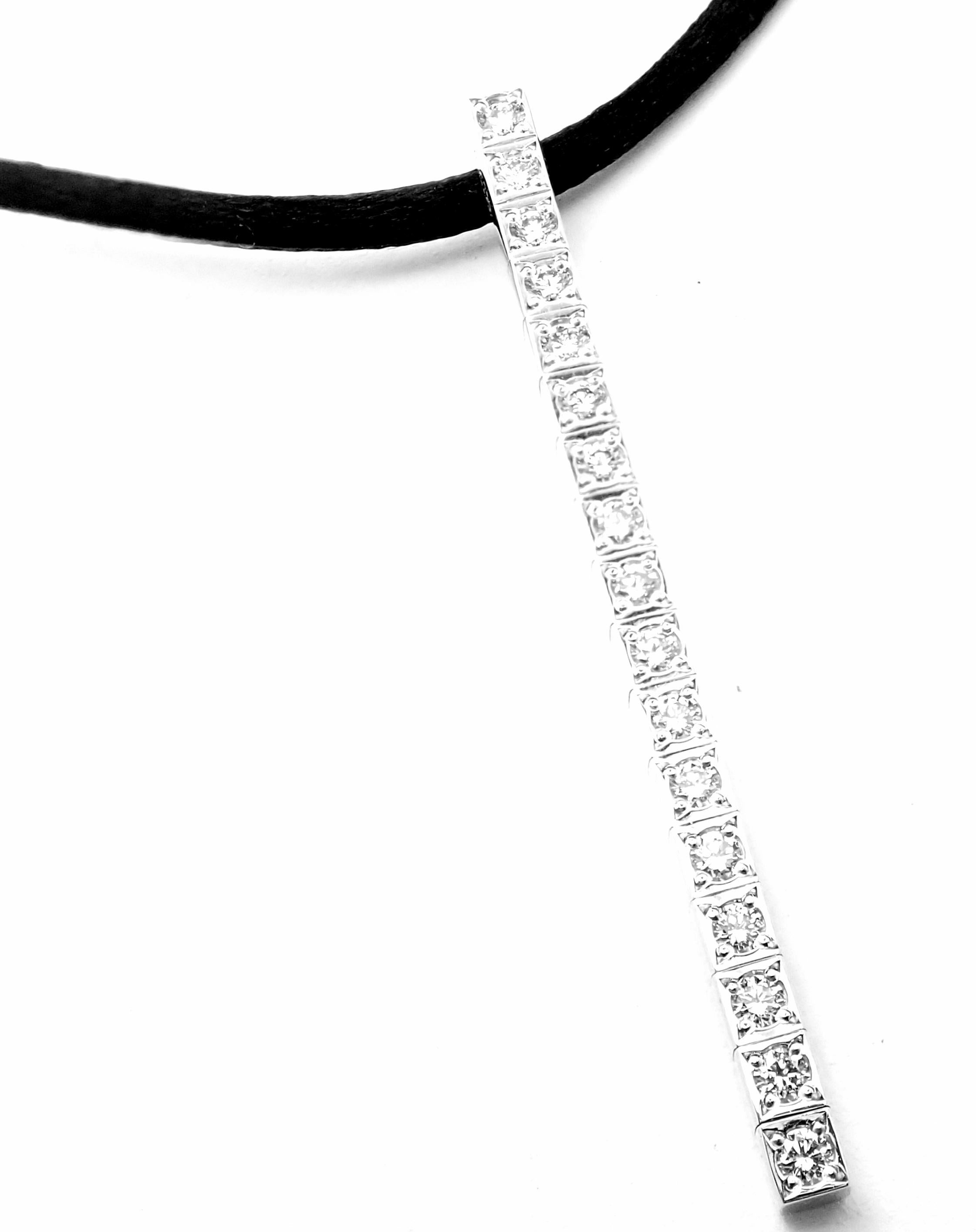 18k White Gold Lanieres Diamond Line Pendant on a Silk Cord Necklace by Cartier. 
With 17 round brilliant diamonds, E color, VVS1 clarity total weigh approximately .51ct
Details: 
Length: Length silk cord: 27'' 
Pendant:  50mm x 3mm
Weight: 6.8