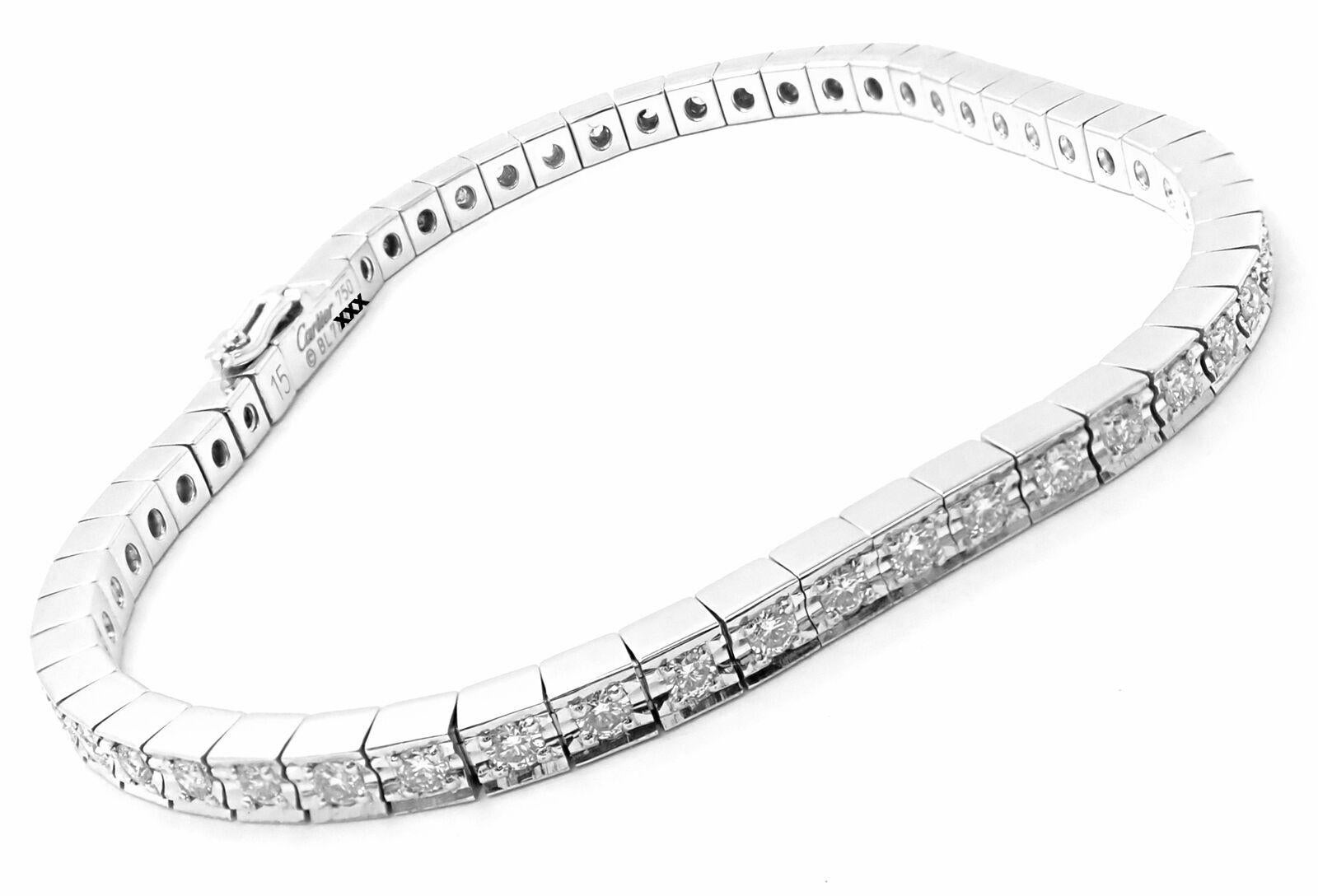 18k White Gold Lanieres Diamond Line Tennis Bracelet by Cartier. 
With Round brilliant cut diamonds E color, VVS1 clarity total weight approximately 2ct
Details: 
Length: 6.5