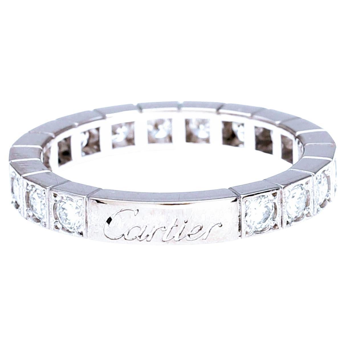 Authentic and original Cartier ring in f white gold 18 Karats weight 4.50 grams. With 18 Diamonds Brilliant cut brilliant estimated total weight 1.05 cts. It is signed and with serial number 53 NA068. Ring Size Number 13 Europe/ 53 milllimeters. 
