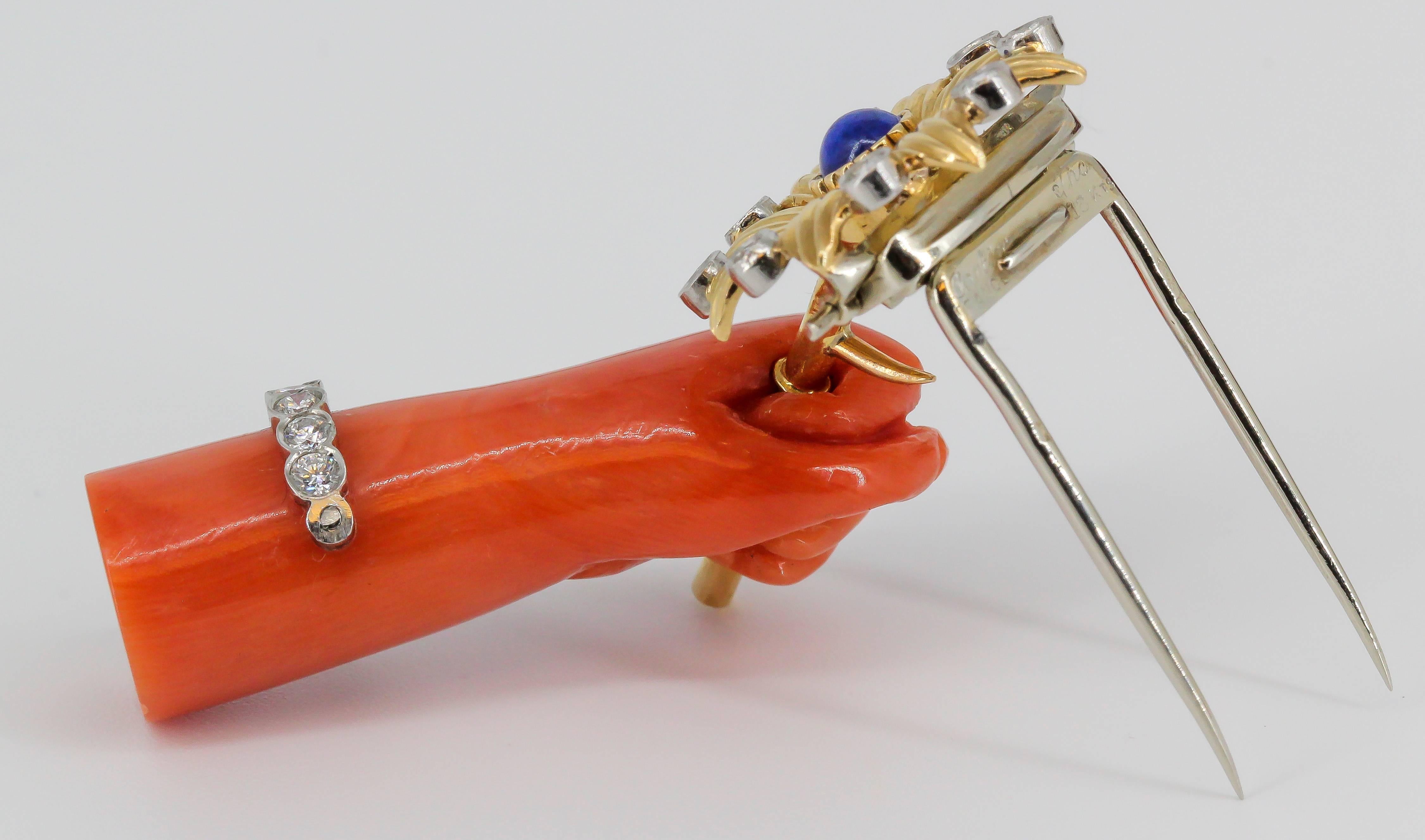 Cartier Lapis, Diamond, Coral Platinum and Gold Hand Holding Flower Brooch In Good Condition For Sale In New York, NY