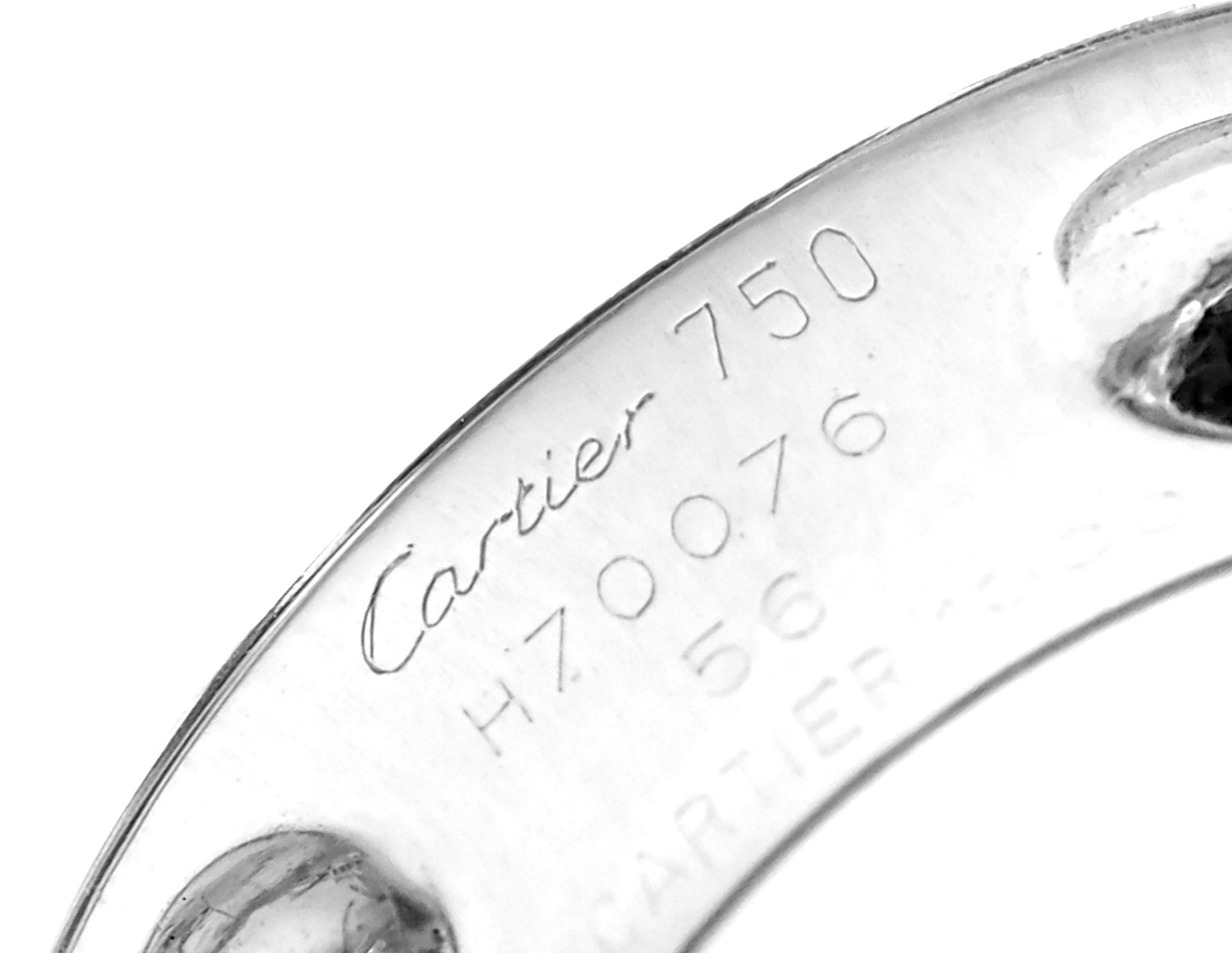 18k White Gold Large Aquamarine Diamonds Ring by Cartier. 
With 1 Large Aquamarine 12mm x 10mm
2 Baguette cut diamonds 
This ring comes with Cartier box and Cartier service paper.
Details: 
Ring Size: European 56 US 7 1/2
Weight:  20.4 grams
Width: