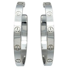 Orecchini a cerchio Cartier Love grandi in oro bianco lucido 18 carati con scatola