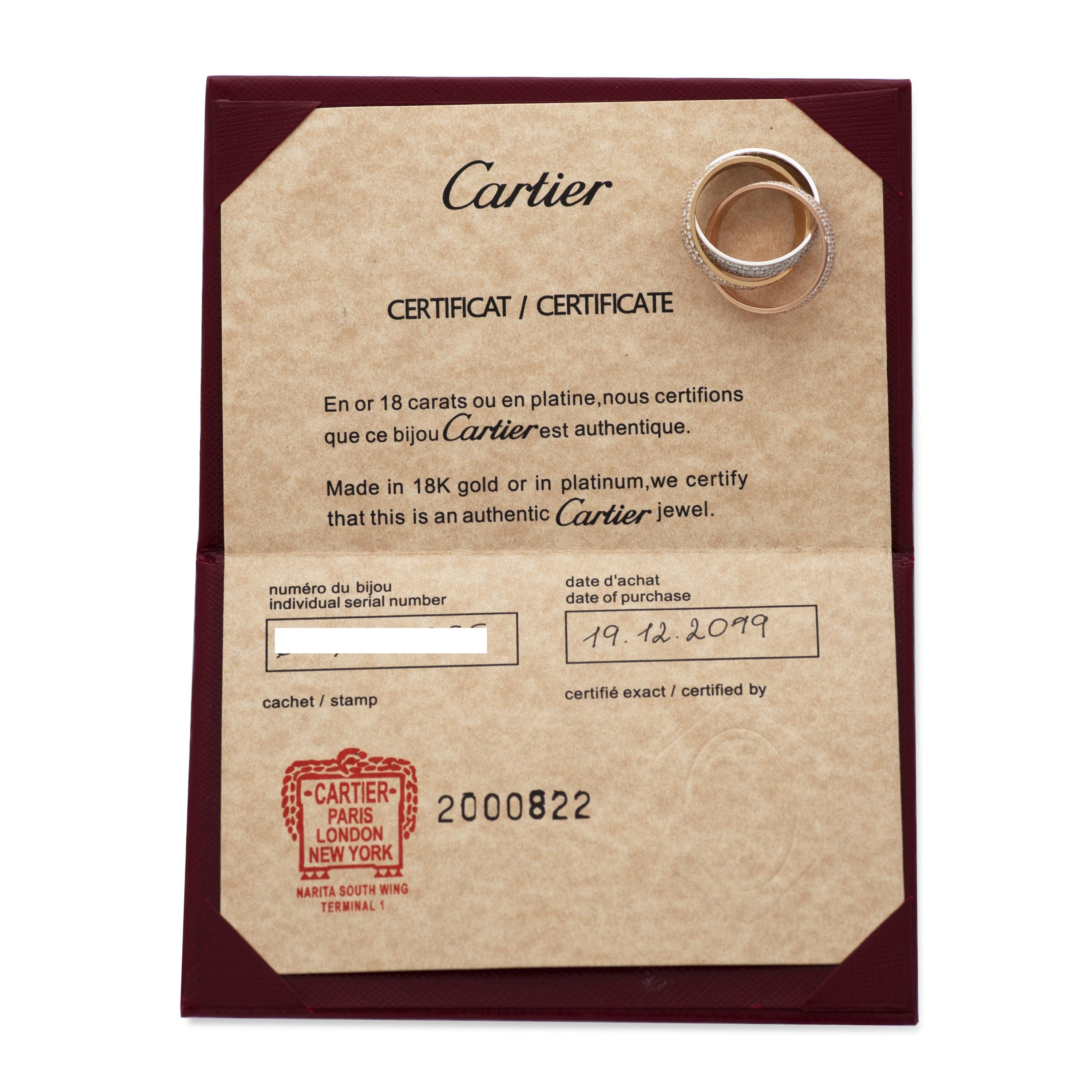 Cartier, grande bague Trinity modèle en or blanc, jaune et rose 18 carats avec diamants Pour femmes en vente