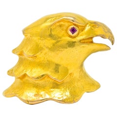 Cartier Large Retro Ruby 18 Karat Gold Eagle Bust Unisex Brooch, circa 1950