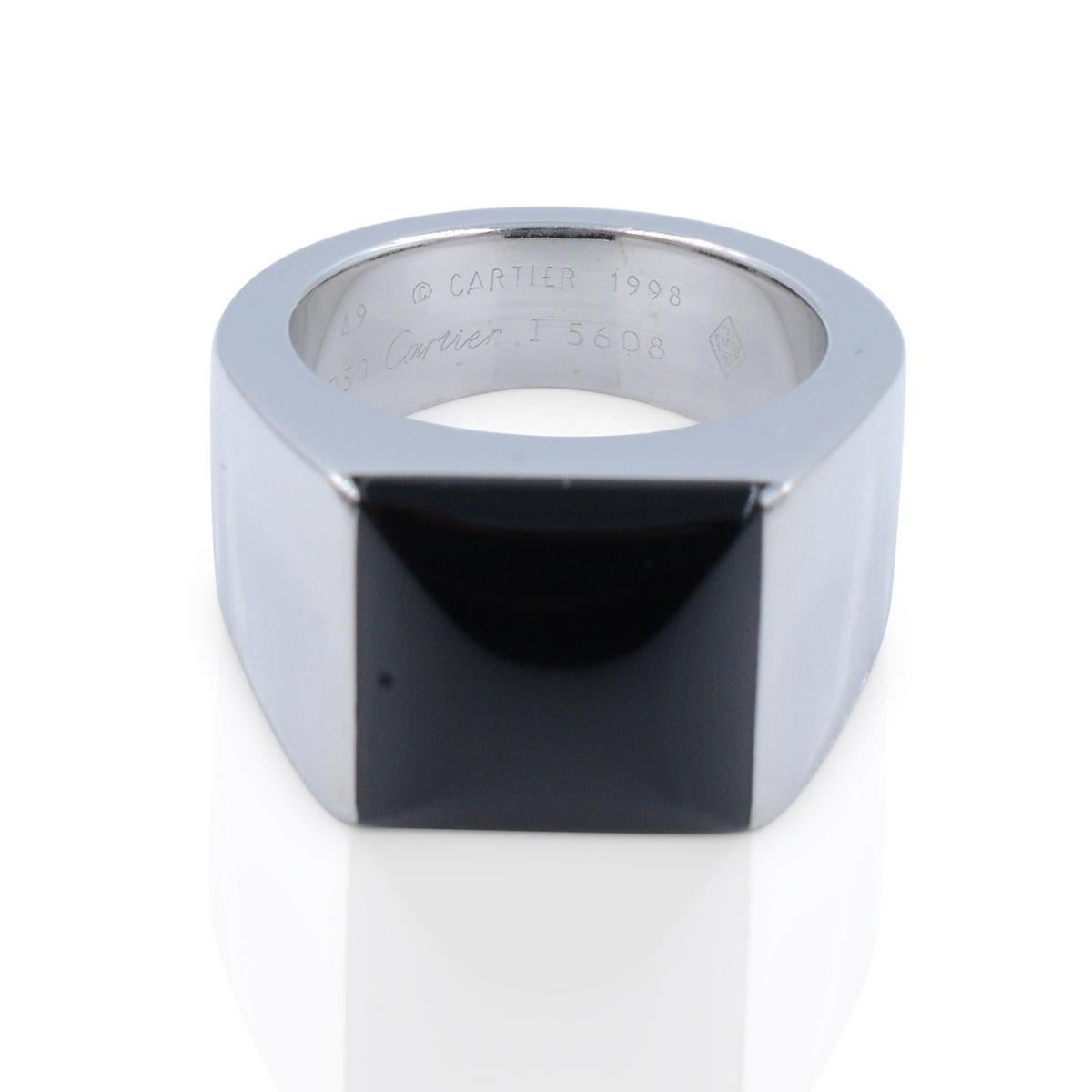 We guarantee this is an authentic CARTIER 18K White Gold Black Onyx Tank Ring size 4.5 but can fit 4.75 as well. EU size is 49. 

Ring was created in 1998. Beautiful condition, or 100% of your money back. 

This lovely ring is made of 18 karat white