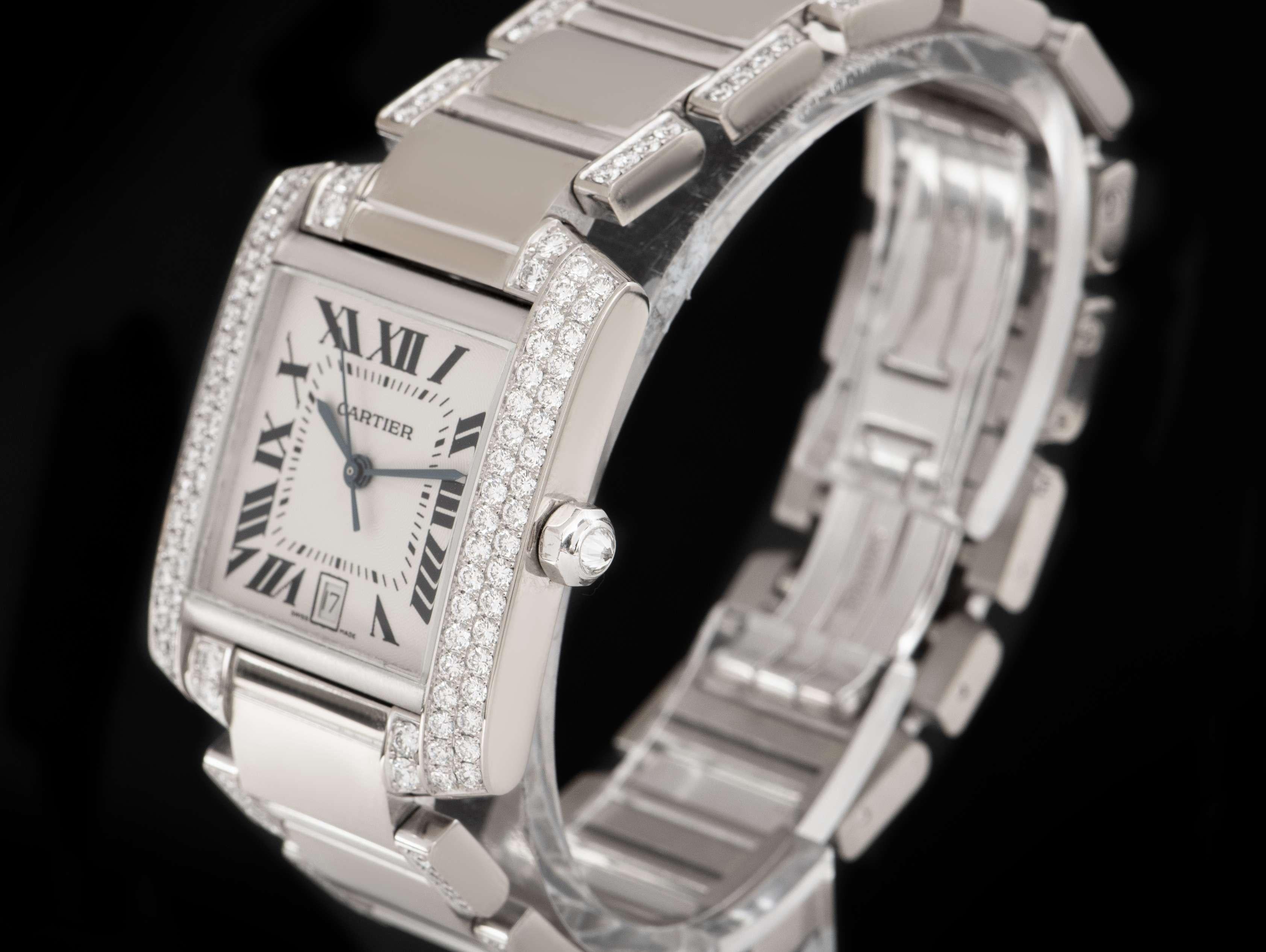 An 18k White Gold Tank Francaise Large Unisex Wristwatch, silver guilloche dial with roman numerals and a secret signature at 