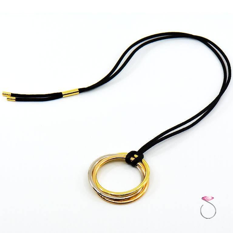 Cartier Large Trinity Necklace, 18 Karat Tri-Color Gold on a Cord In Excellent Condition In Honolulu, HI