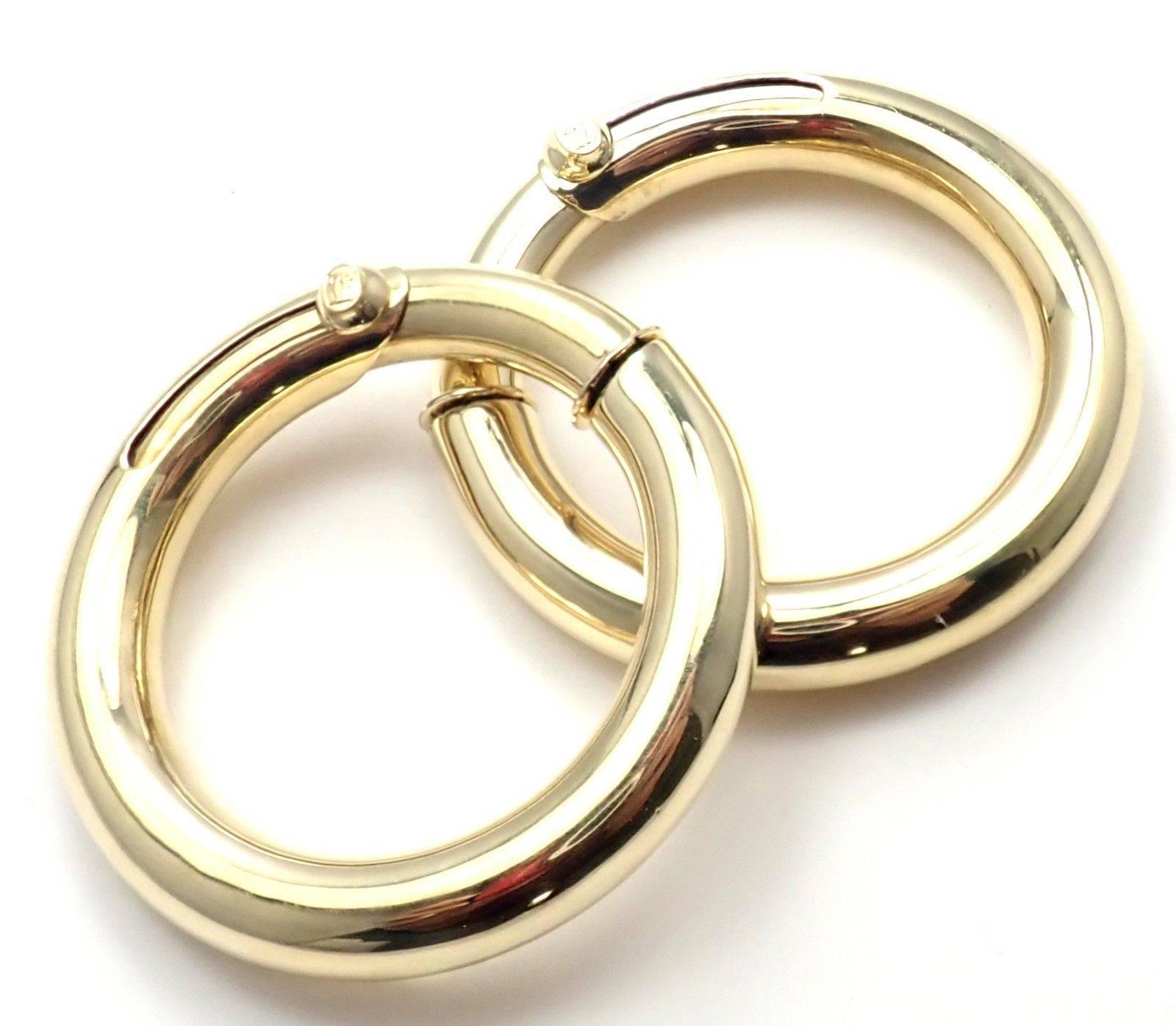 18k Yellow Gold Large Hoop Earrings by Cartier. 
These earrings are for pierced ears. 
Details: 
Weight: 21 grams
Measurements: 41mm
Stamped Hallmarks: Cartier 750 B0920 Double C
*Free Shipping within the United States* 
YOUR PRICE: $4,500
T1809odad