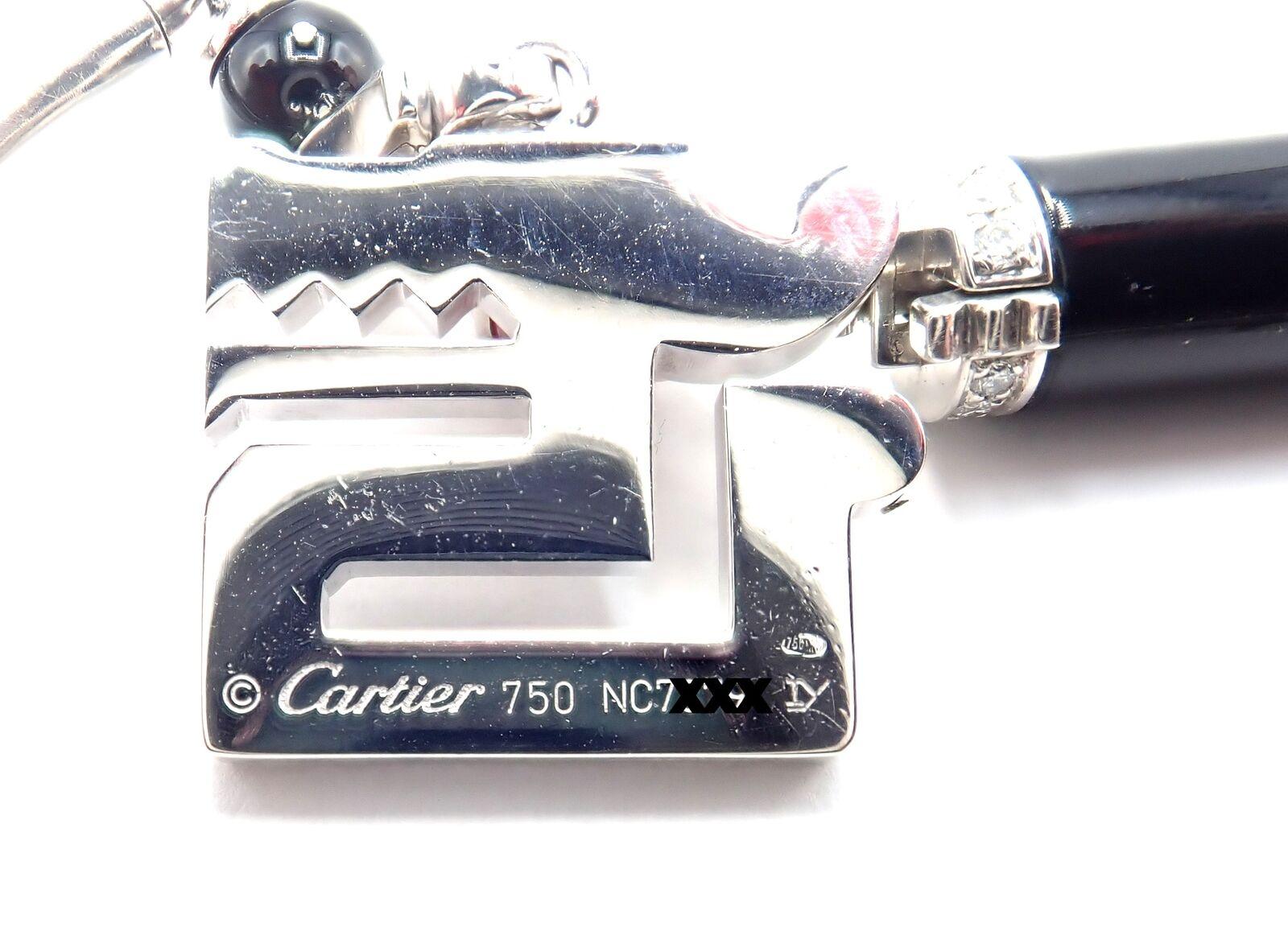 Brilliant Cut Cartier Le Baiser Du Dragon Diamond Ruby Onyx Two Charms White Gold Bracelet For Sale