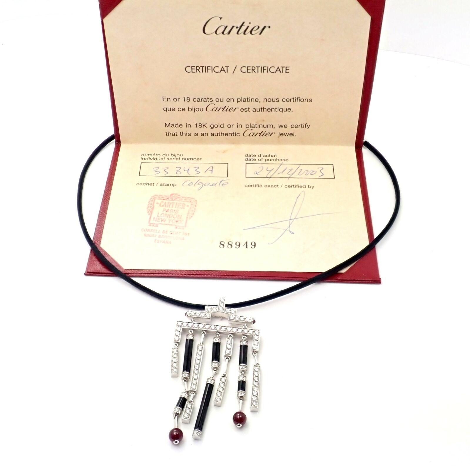 Cartier: Halskette mit Anhänger Le Baiser Du Dragon, Onyx, Rubin, Diamant, Gold (Brillantschliff) im Angebot