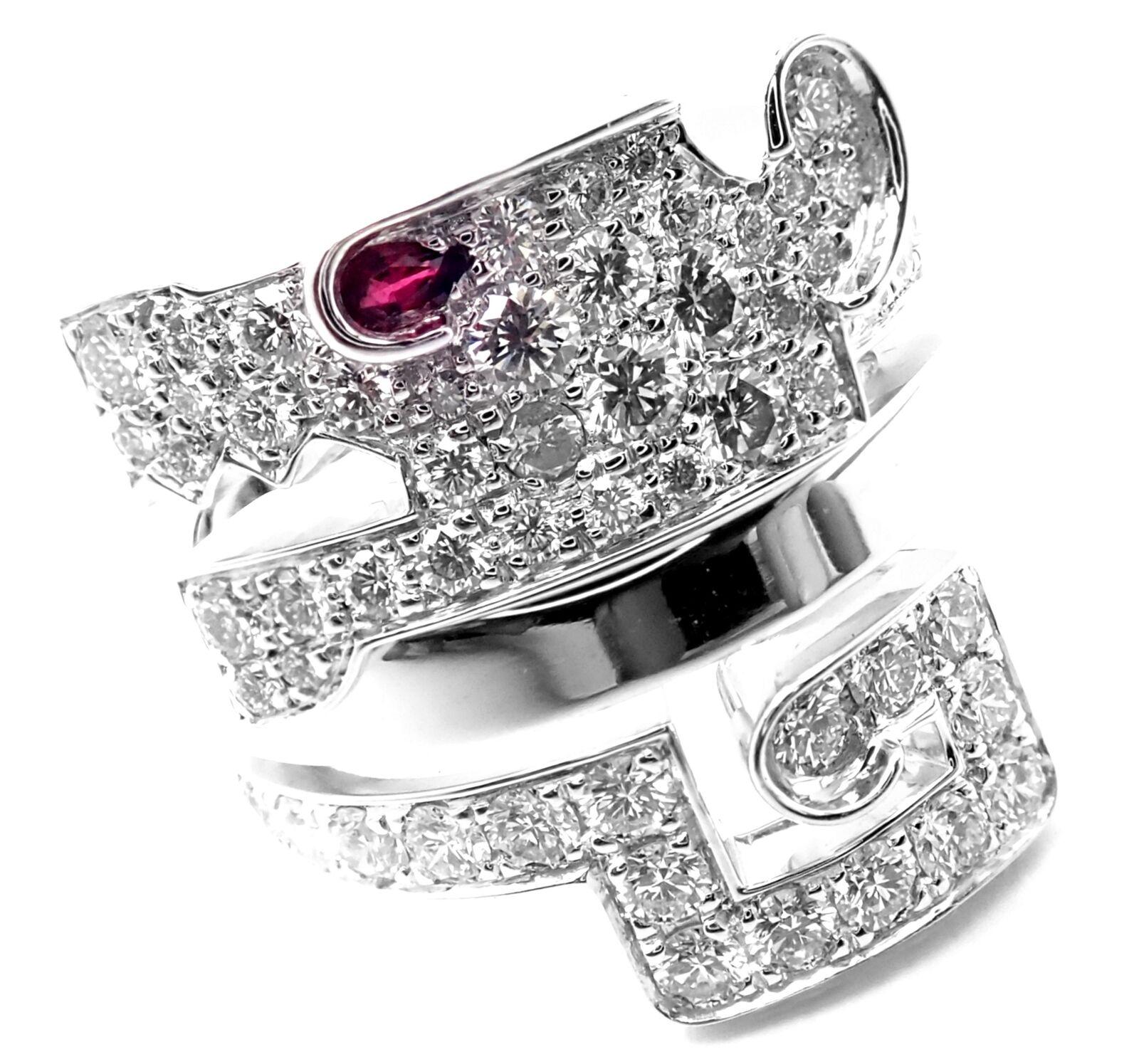 18k White Gold Le Baiser Du Dragon Diamond Ruby Ring by Cartier. 
With 56 round brilliant cut diamonds VVS1 clarity, E color total weight 
approx. 1.68ct
This ring comes with Cartier box and a service paper from a Cartier store.
Details: 
Ring Size: