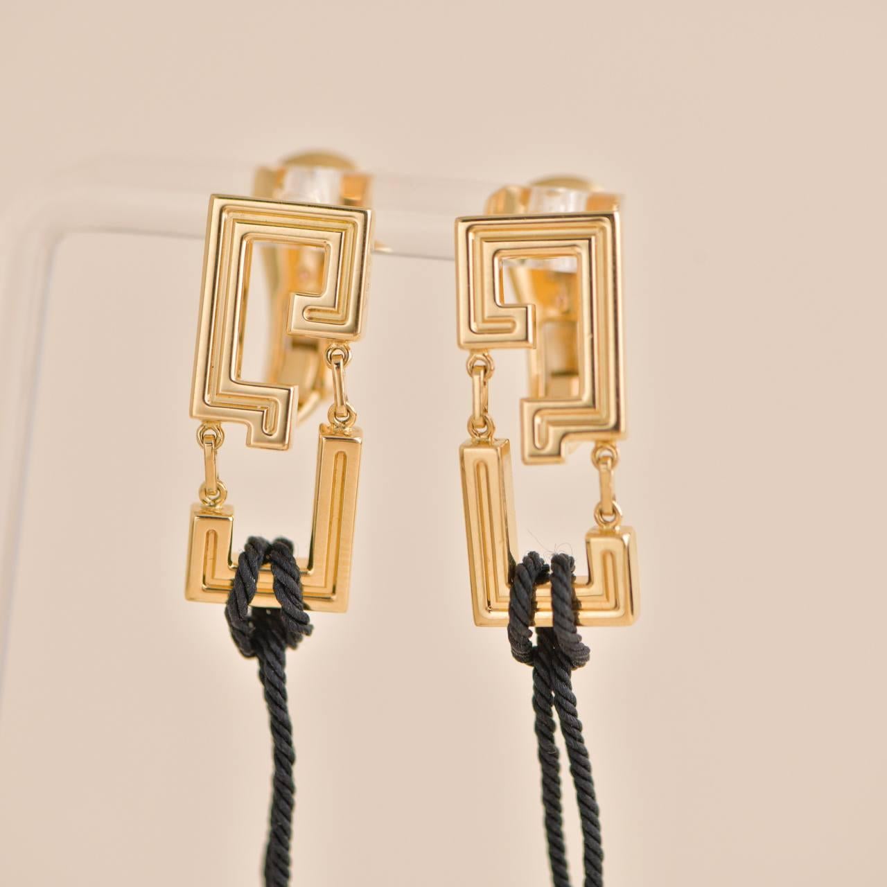 Cartier Le Baiser Du Dragon Boucles d'oreilles en or jaune et rubis Excellent état - En vente à Banbury, GB