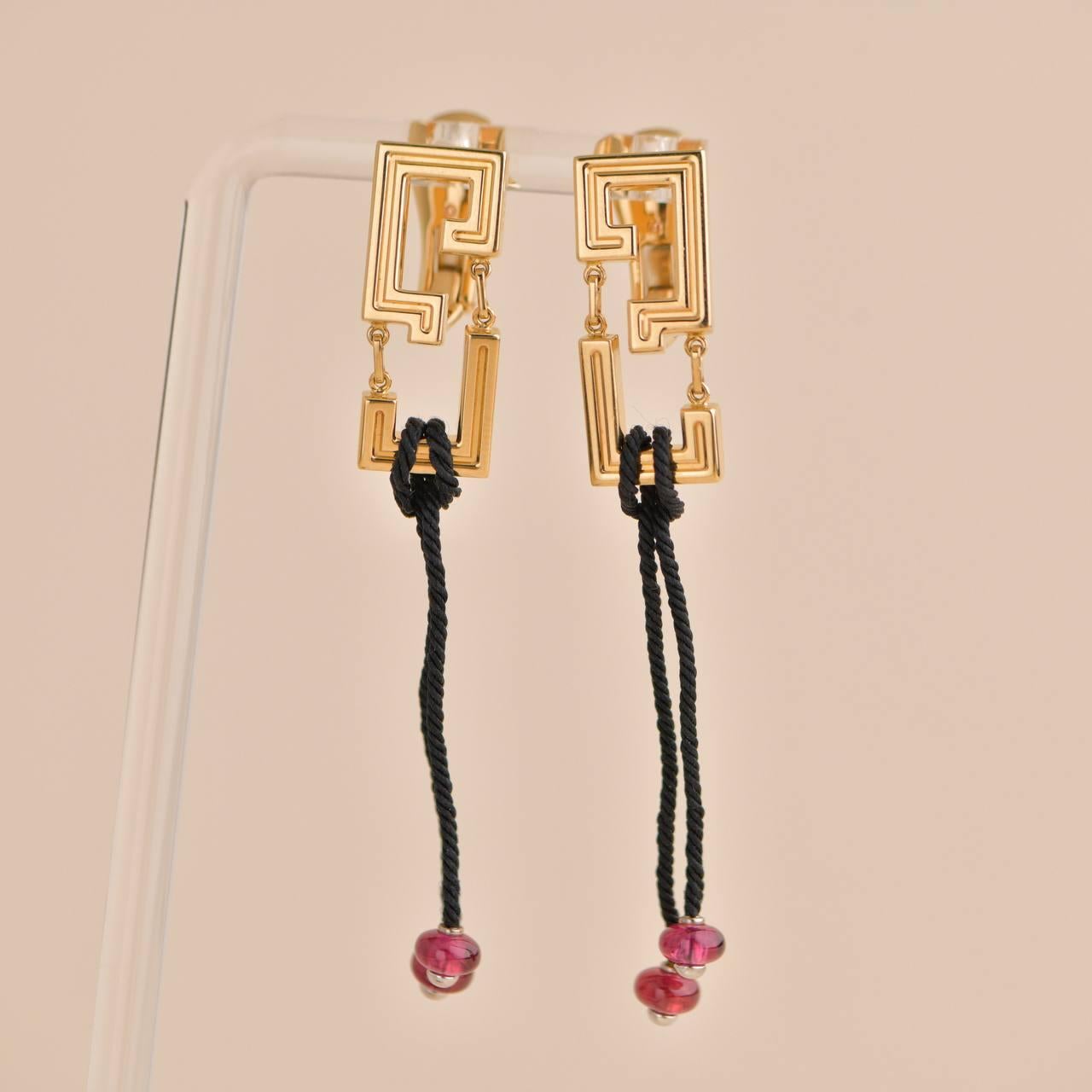 Women's or Men's Cartier Le Baiser Du Dragon Ruby Yellow Gold Earrings For Sale