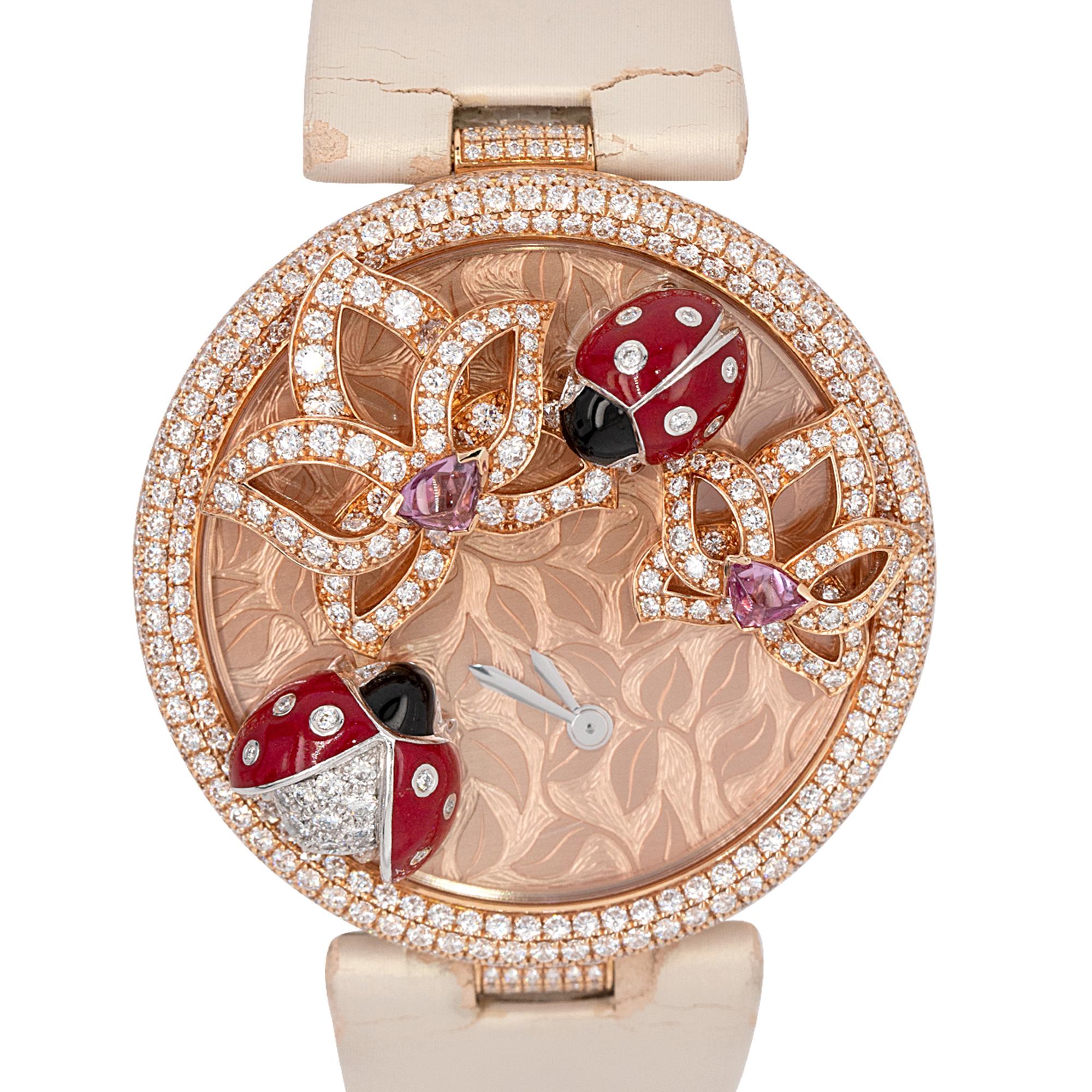 Indulge in luxury with the Cartier Le Cirque Animalier Coccinelles Ladies Watch. This exquisite timepiece features a 43mm case crafted from 18k rose gold, exuding elegance and sophistication. The bezel, also in 18k rose gold, is adorned with