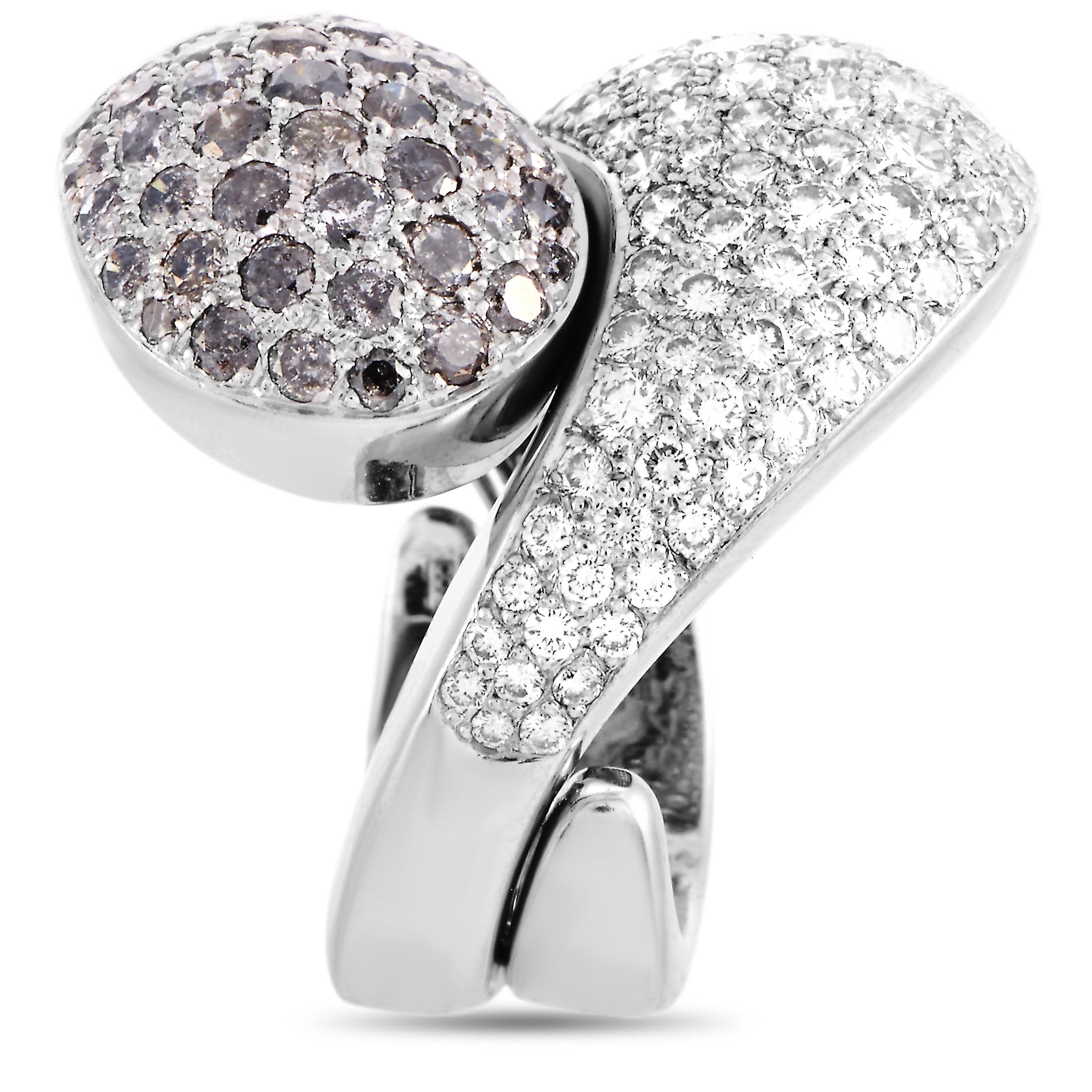 The Cartier “Le Yin et Le Yang” ring is made of 18K white gold and embellished with white and black diamonds. The ring weighs 19.9 grams, boasting band thickness of 8 mm and top height of 6 mm, while top dimensions measure 25 by 20 mm.
 
 Offered in