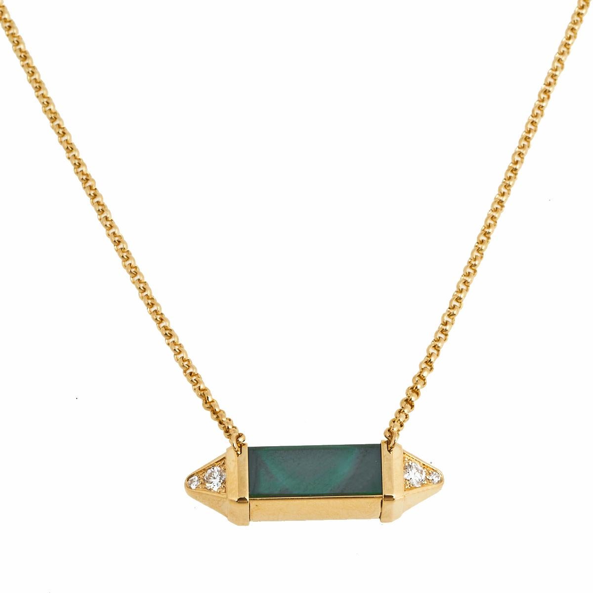 The Cartier Les Berlingots de Cartier necklace brings the best of craftsmanship and elegance. This medium model is made of 18k yellow gold and the stunning pendant is laid with malachite and diamonds.

Includes: Original Box, Original Case,