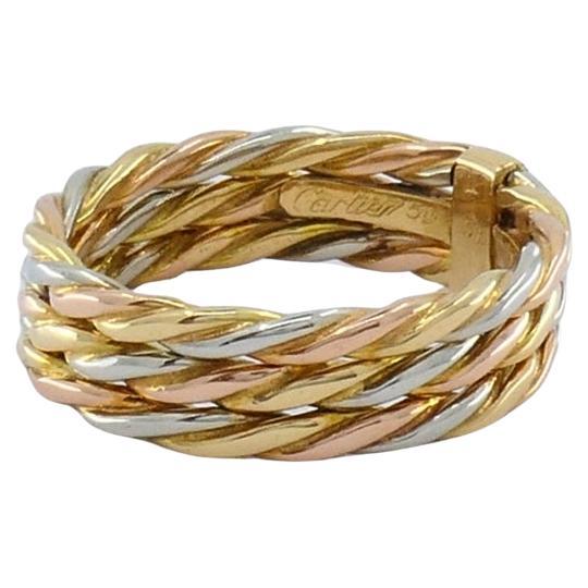 Must de Cartier Anello Trinità intrecciato in oro 18 carati in vendita