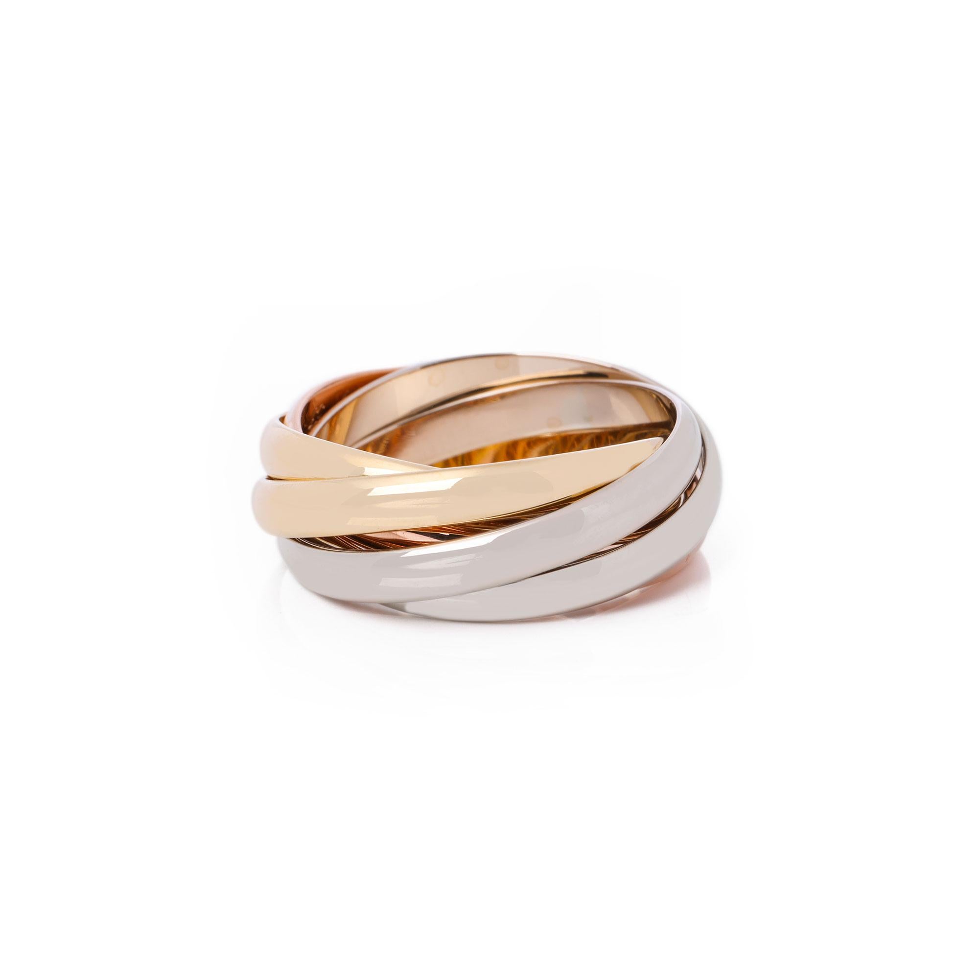 This ring by Cartier is from their Les Must De Cartier Trinity collection and features five 18k yellow, white and rose gold interlinking bands. This ring cannot be re sized. Complete with a Xupes presentation box. Our Xupes reference is J756 should