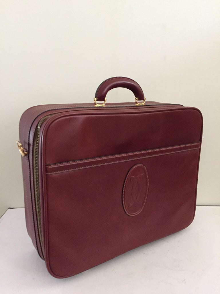 Cartier Les Must de Cartier Burgundy Leather Travel Overnight Suitcase / Luggage at 1stdibs