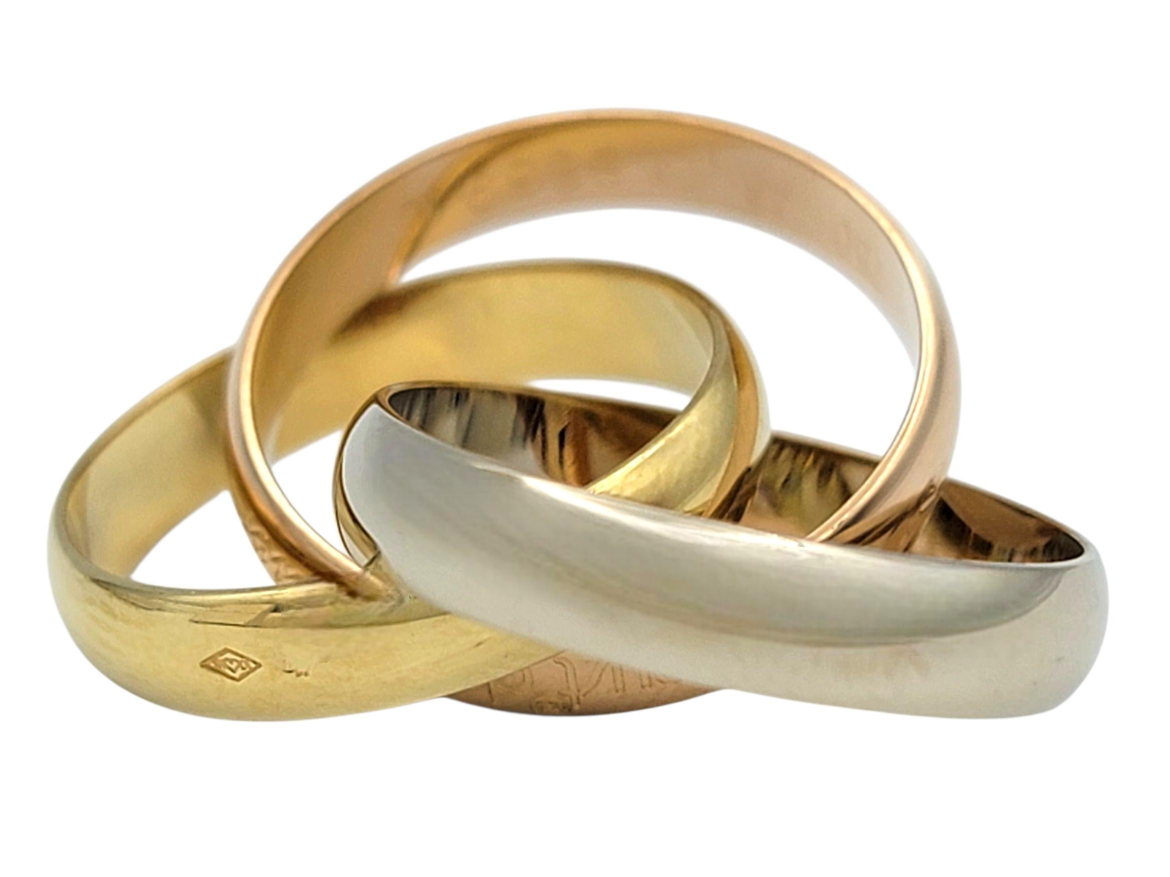 Anello a fascia a trinità Les Must de Cartier in oro giallo, rosa e bianco 18 carati in vendita 1