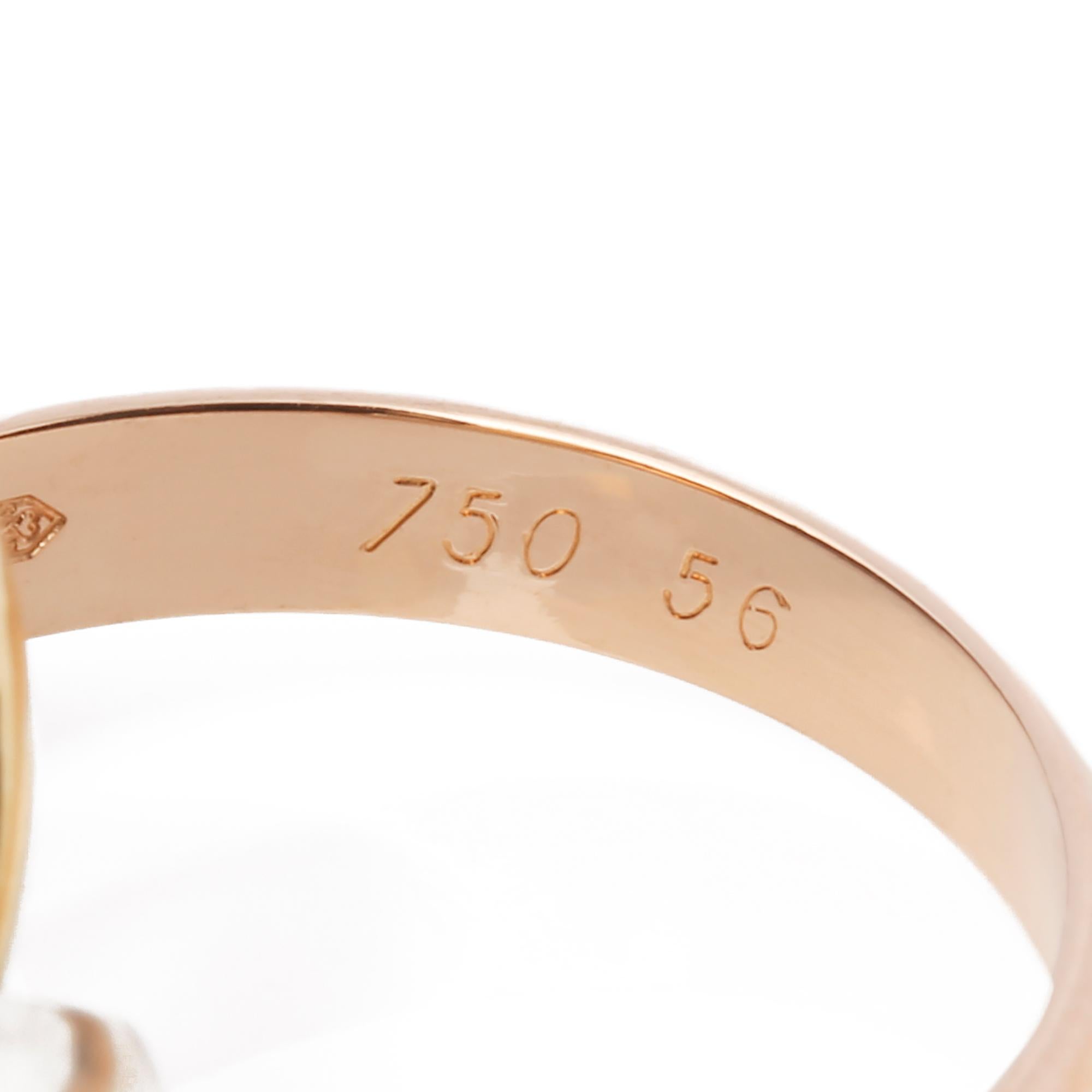 This ring by Cartier is from their Trinity collection and features 18k yellow, white and rose gold interlinking bands. UK ring size P. EU ring size 56. US ring size 7 1/2. This ring cannot be re sized. Complete with a Xupes presentation box. Our