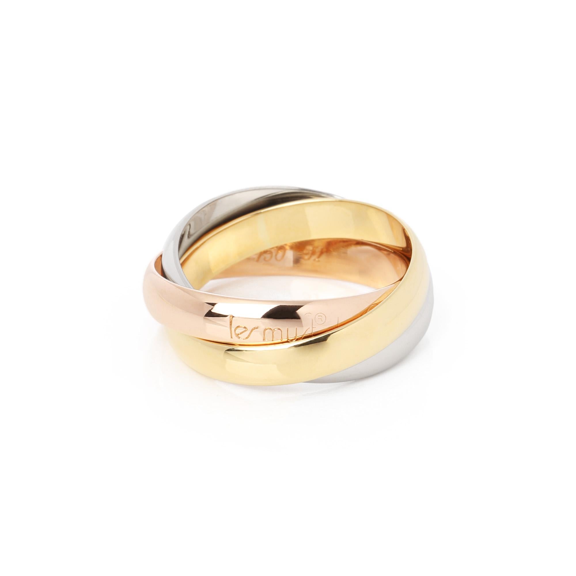 This ring by Cartier is from their Must De Cartier Trinity collection and features 18ct yellow, white and rose gold interlinking bands. UK ring size L. EU ring size 51. US ring size 6. This ring cannot be re sized. Complete with a Xupes presentation