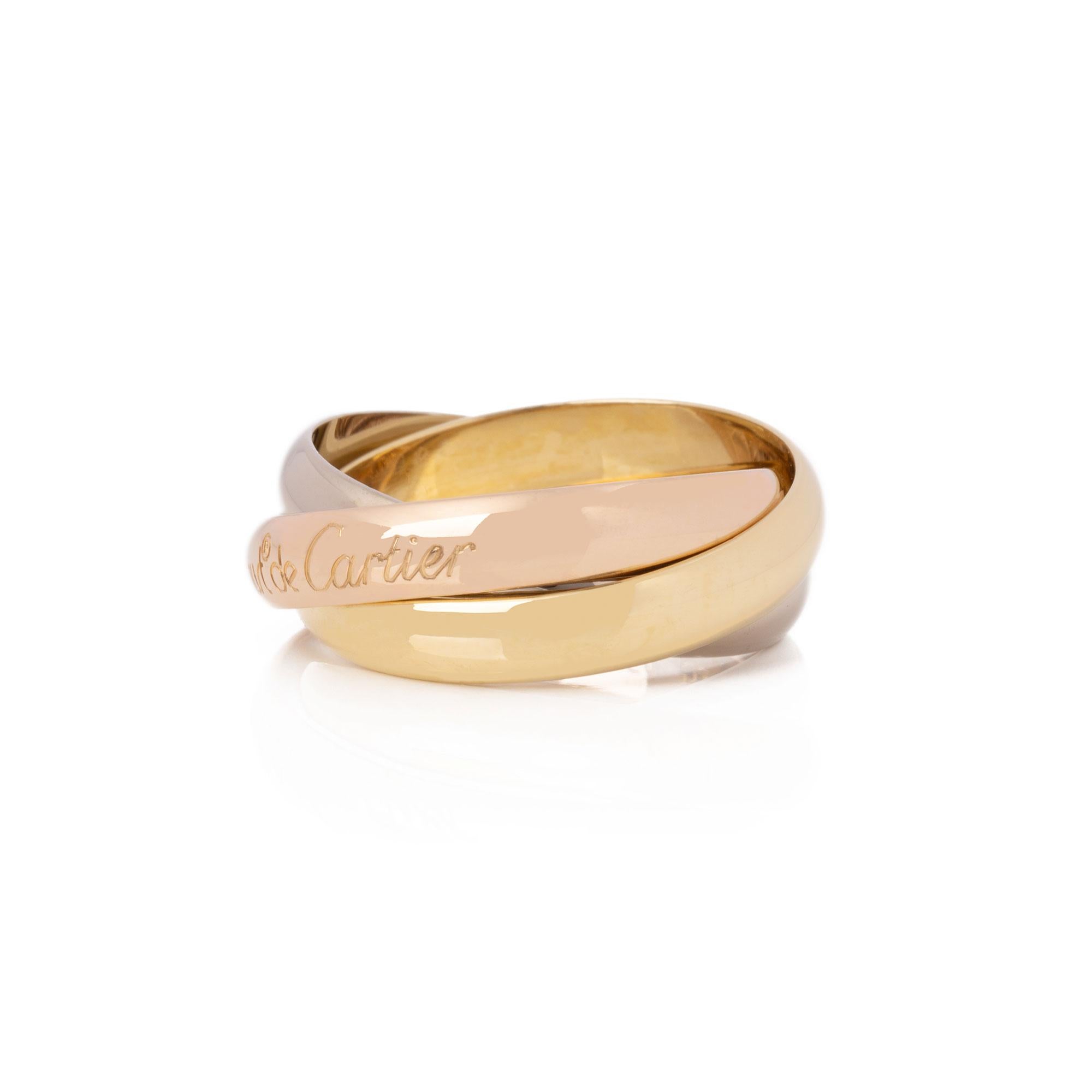 This ring by Cartier is from their Trinity collection and features 18ct yellow, white and rose gold interlinking bands. This ring cannot be re sized. Complete with a Cartier box. Our Xupes reference is J767 should you need to quote this. UK ring