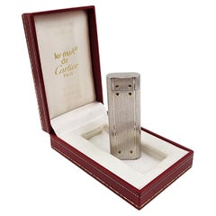 Cartier Lighter Circa 80s Vintage Model "Santos Palladium" in silver and gold