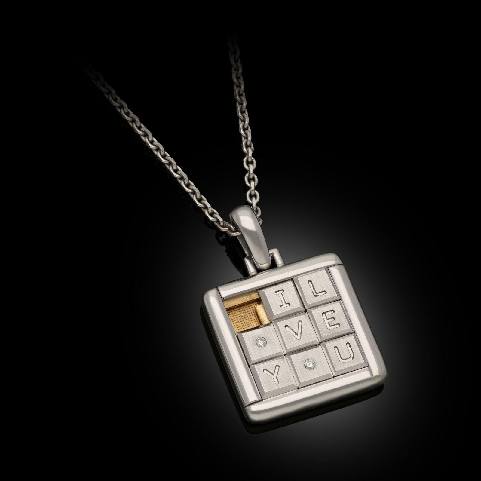 A rare 18ct white gold and diamond puzzle pendant by Cartier 1997, the pendant of square shape formed as a sliding puzzle with eight movable tiles which spell out the phrase ‘I LOVE YOU’, each letter O formed of a small round brilliant cut diamond,