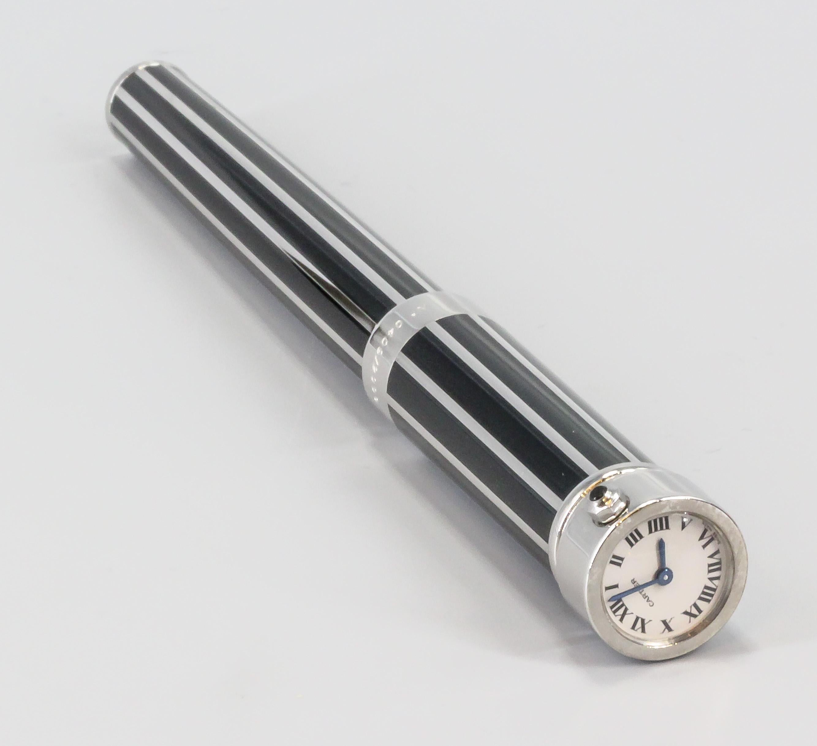 Introducing the epitome of elegance and innovation, the Cartier Limited Edition Fountain Pen Watch - a true marvel that seamlessly blends the art of fine watchmaking with the timeless allure of a luxurious fountain pen. This exclusive piece is a