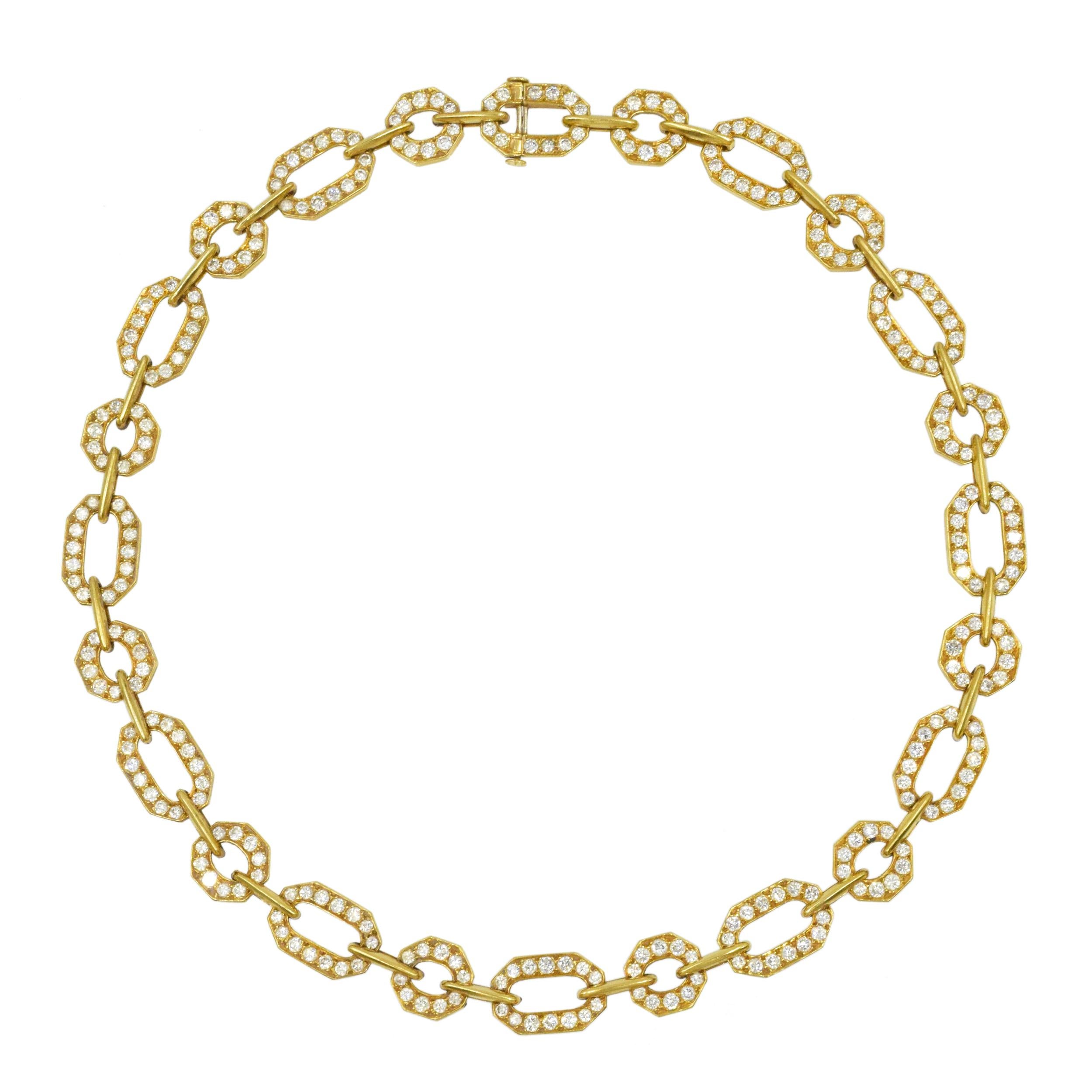 Classic Cartier diamond necklace in 18k yellow gold. The necklace alternates round and oval shaped links encrusted  with 288 round brilliant cut diamonds, with total weight approx;. 11.50 carats, color F-G clarity VS 
Inscribed: Cartier, xxxxx,