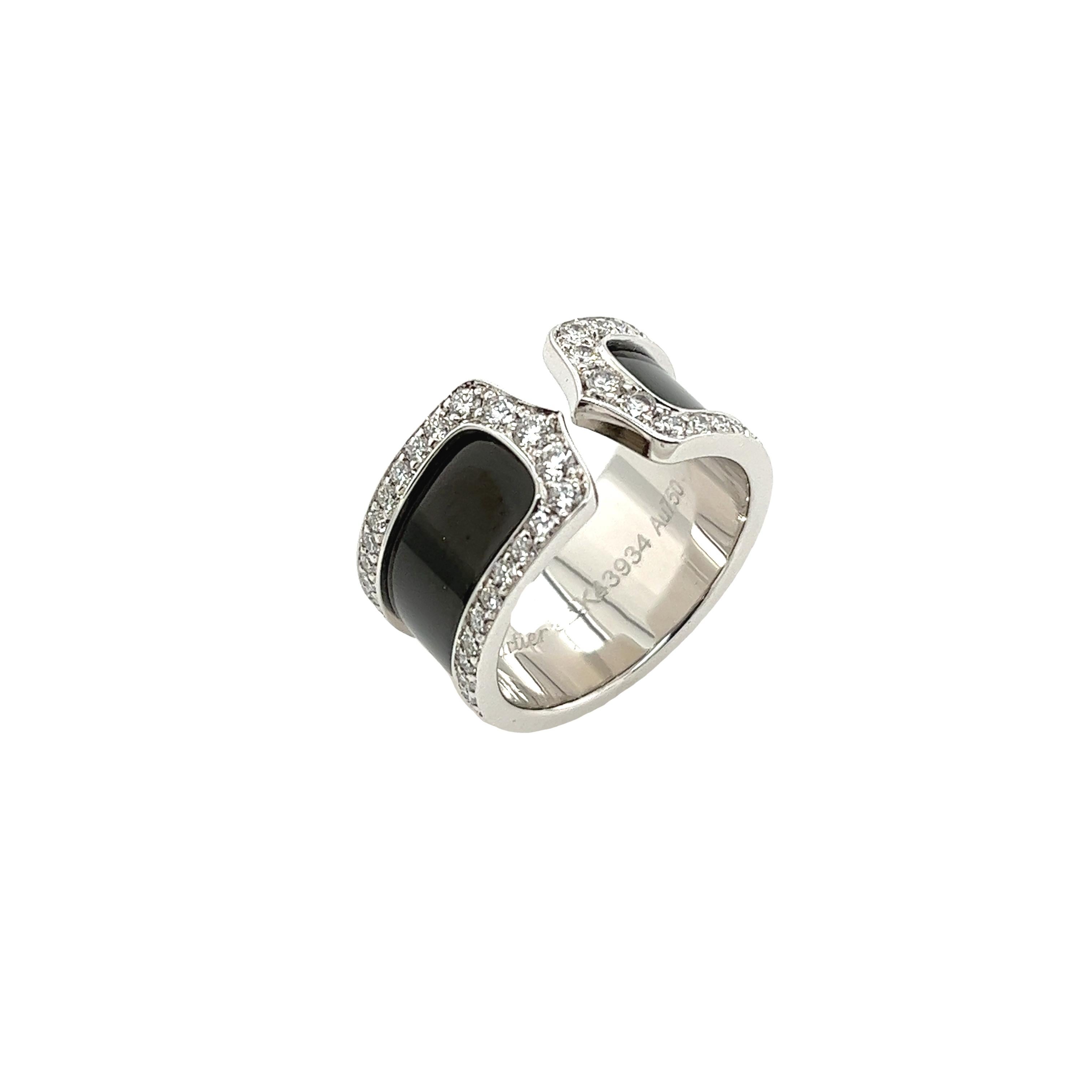 Embrace elegance with the Cartier Logo Double C De Cartier Ring in 18ct white gold. Adorned with dazzling diamonds and featuring the iconic double C logo, this ring is a symbol of luxury and sophistication. Designed to captivate with its delicate