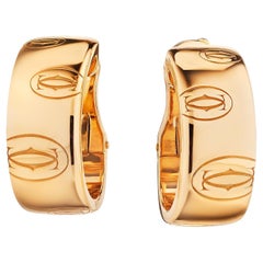 Cartier Créoles modernistes en or rose avec logo