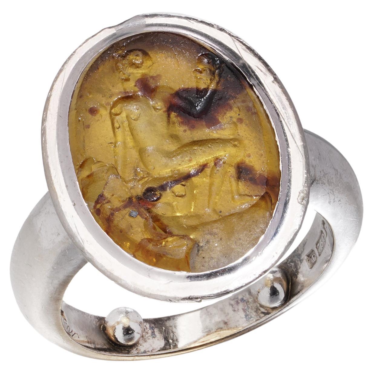 Cartier London 18kt white gold and Amber Intaglio Ring, 1993 For Sale