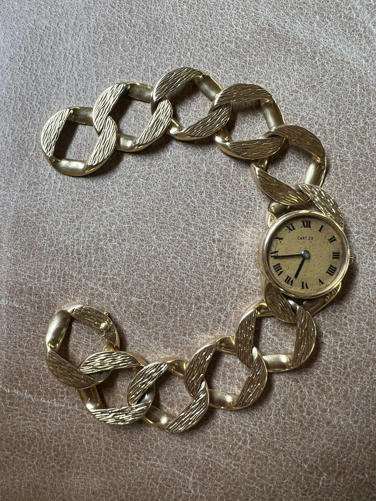 Cartier London Jaeger LeCoultre 18k Yellow Gold Curb Link Bracelet Watch Circa 1960s Vintage

Here is your chance to purchase a beautiful and highly collectible designer bracelet watch.  

The length is 7.25 inches.  The weight is 65 grams.  The