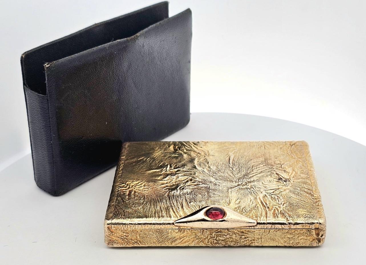 Amazingly made English hallmarked, high finish 9-karat gold Cartier London compact. Crafted with exquisite attention to detail, this luxurious compact features a distinctive textured lava-like design that showcases the unparalleled craftsmanship of