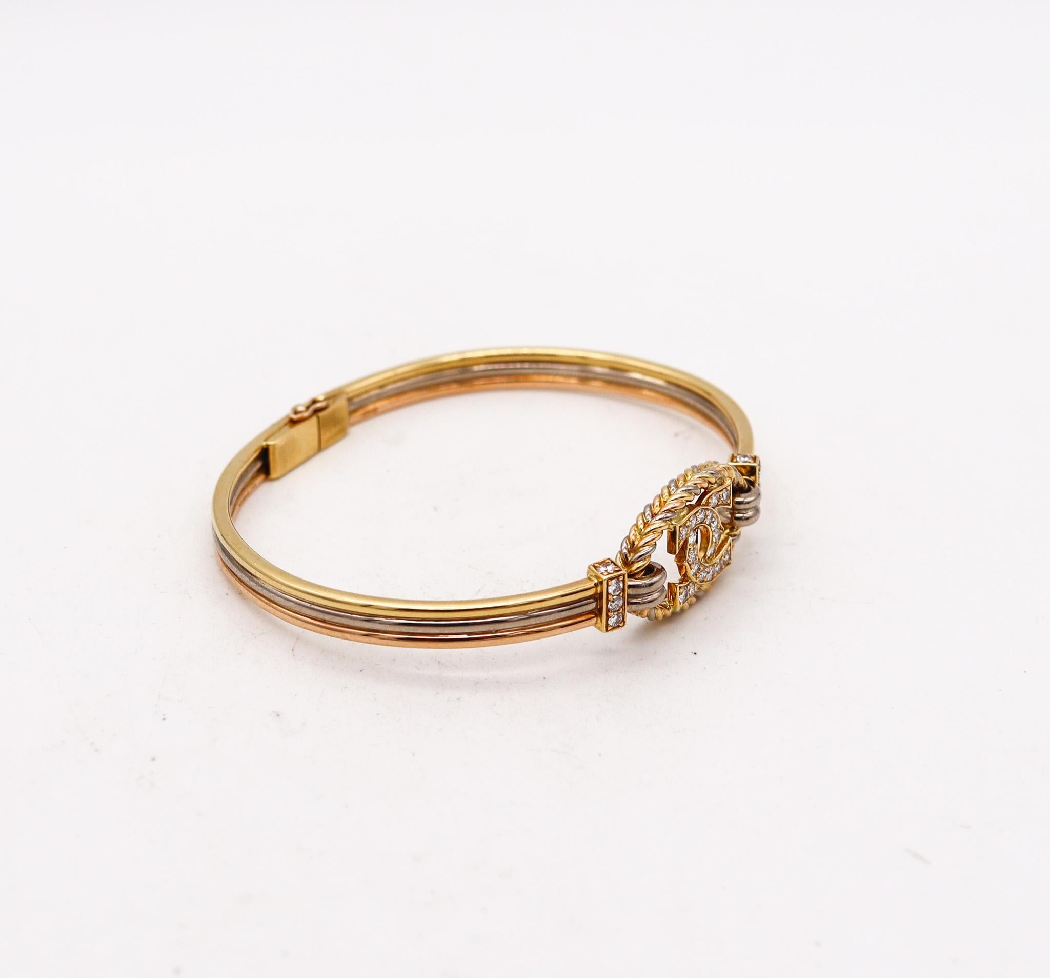 Cartier London Vintage Trinity Bangle Bracelet In 18Kt Gold With VS Diamonds In Excellent Condition In Miami, FL