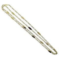 Cartier Collar largo de eslabones de cadena ovalada de oro amarillo con espejo y bolsa