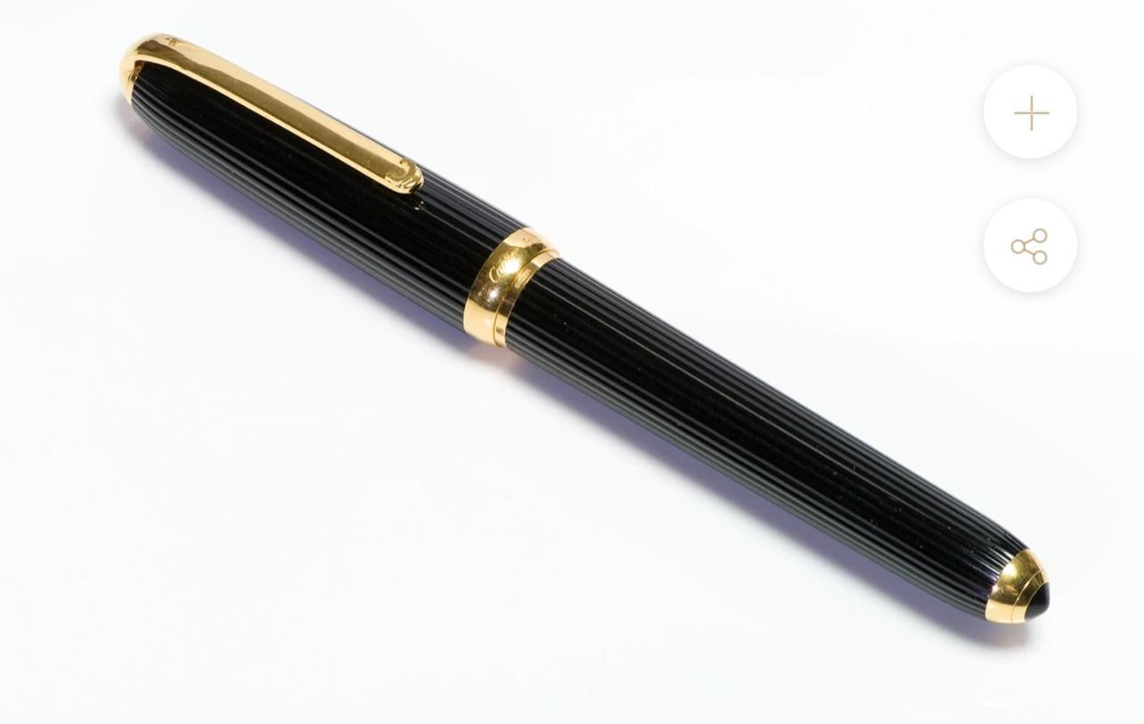 100 % authentic and Vintage 
Stamped Cartier Paris , 018667, Made in France, Plaque Or G
No ink Refill in the pen

Size] Length: 14.1 cm
Color] Gold and black
Ink: none
No Box
CONDITION: Pre-owned
DESIGNER / HALLMARKS: Cartier
METAL: Gold Plate
Gem