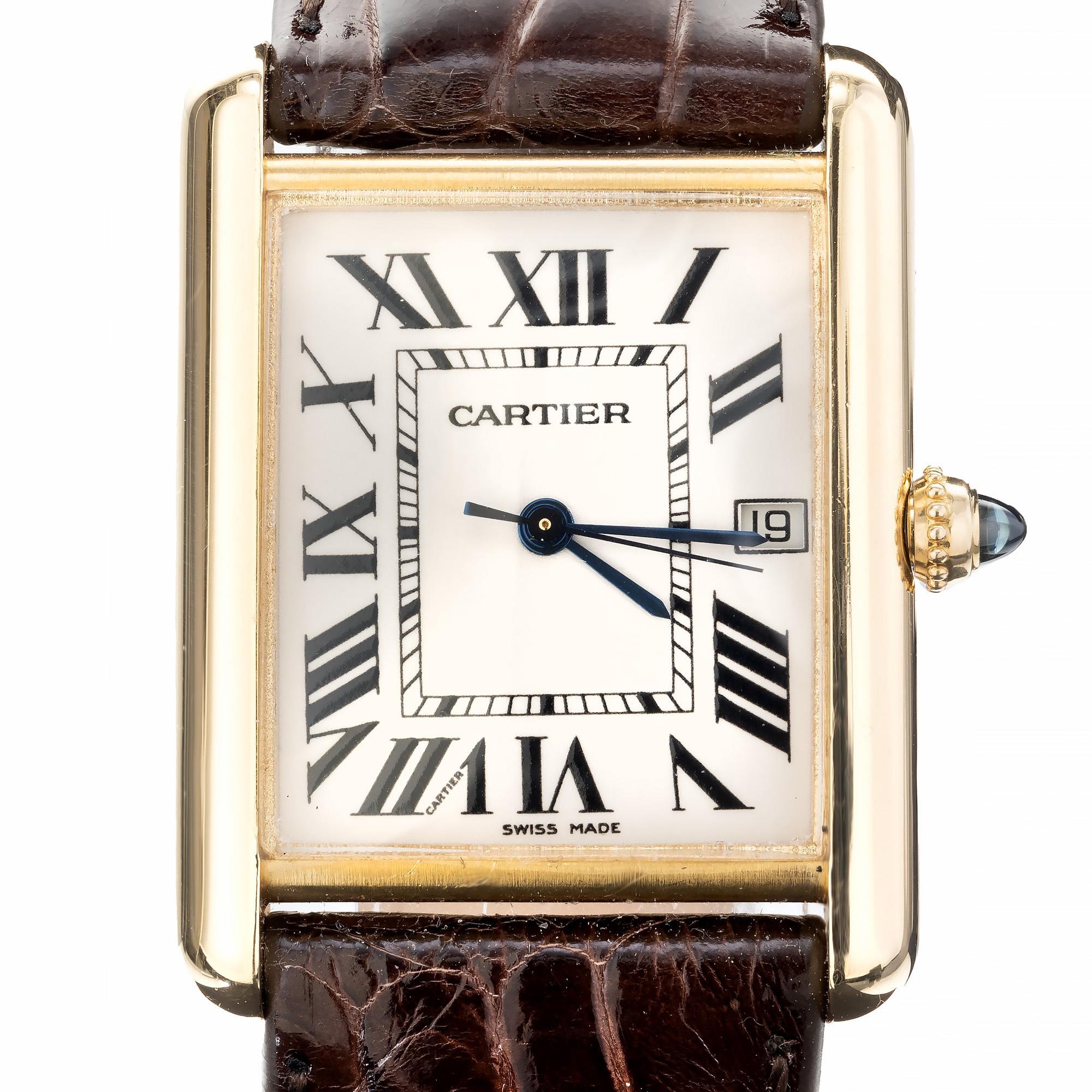 Classic large size Cartier Tank Louis quartz date wristwatch. 18k yellow gold with a white dial with Roman Numerals. New Alligator band. Service warranty. One of Cartier's signature wristwatches. 
Louis Cartier designed and created the The Tank