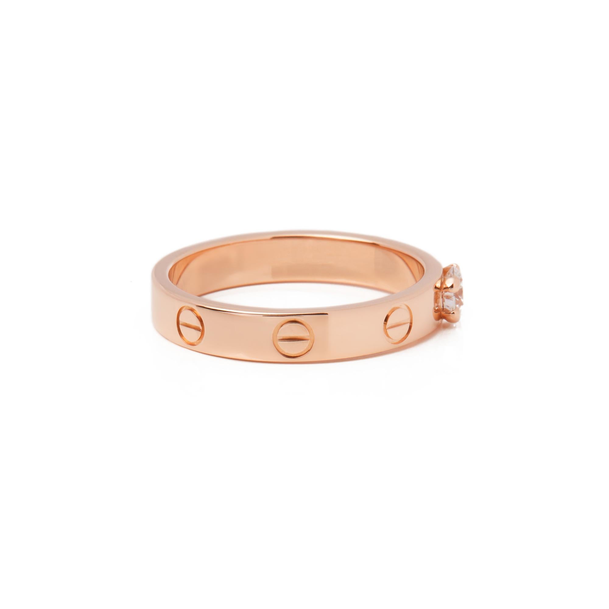 This ring by Cartier is from their Love collection and features a central solitaire 0.24ct diamond and their iconic screw detailing on an 18ct rose gold band ring.UK Ring Size P, EU size 56, US size 7 1/2. Complete with Xupes presentation box. Our