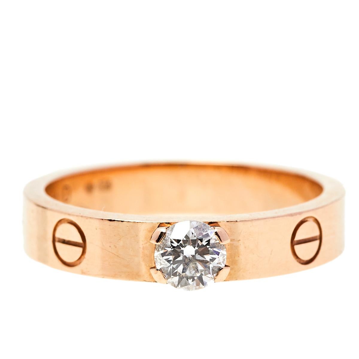 One of the most iconic and loved designs from the house of Cartier, this stunning Love ring is an icon of style and luxury. Constructed in 18K rose gold, this ring features the signature screw details all around the surface as symbols of a sealed