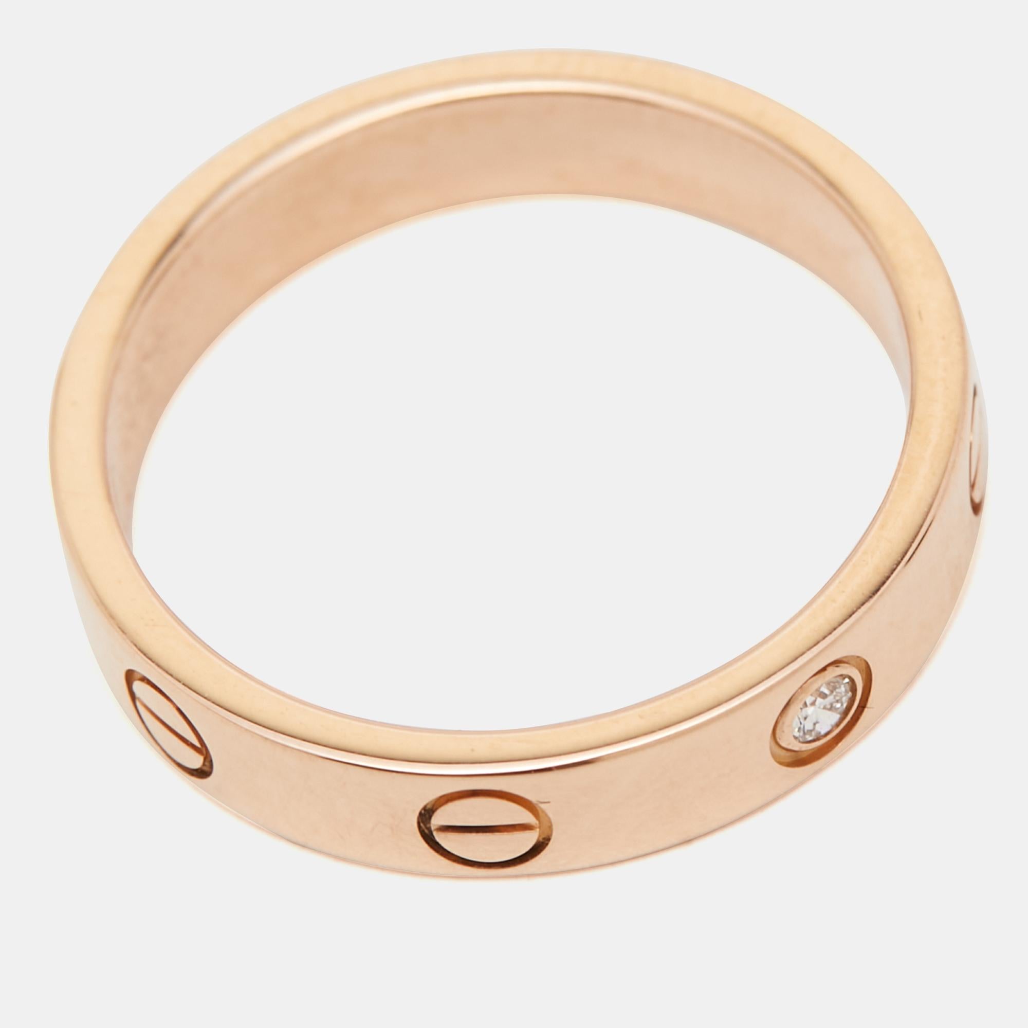 One of the most iconic and loved designs from the house of Cartier, this stunning Love ring is an icon of style and luxury. Constructed in 18k rose gold, this ring features screw details all around the surface as symbols of a sealed and secured