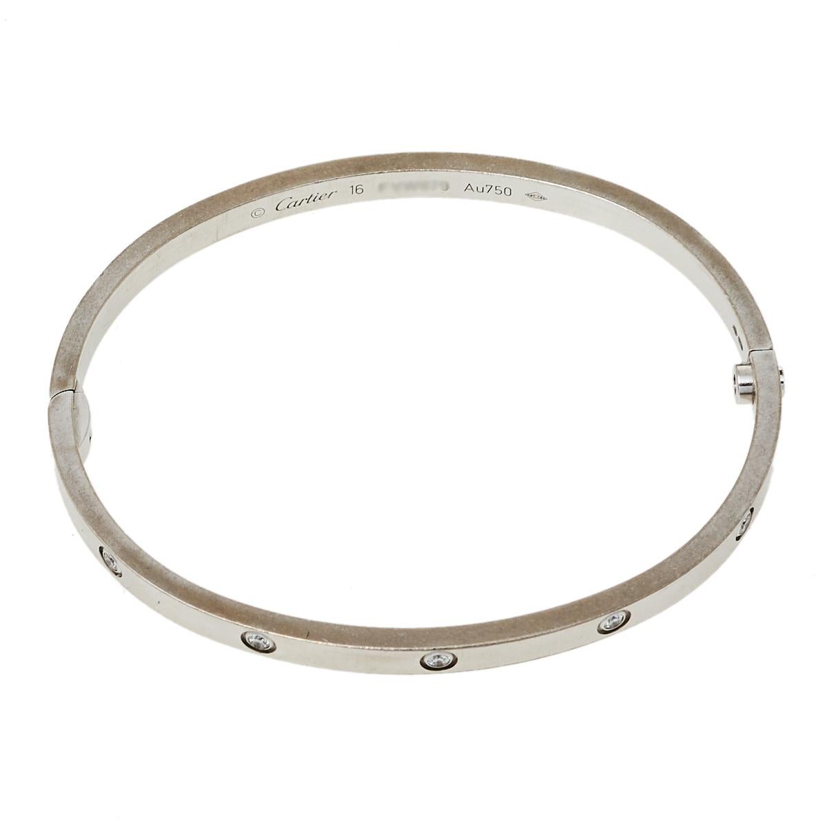 Cartier's Love bracelet is a modern symbol of luxury and a way to lock in one's love. Designed in an oval shape to comfortably sit around your wrist, the iconic love handcuff is laid with distinct screw motifs and secured by screw closure. This